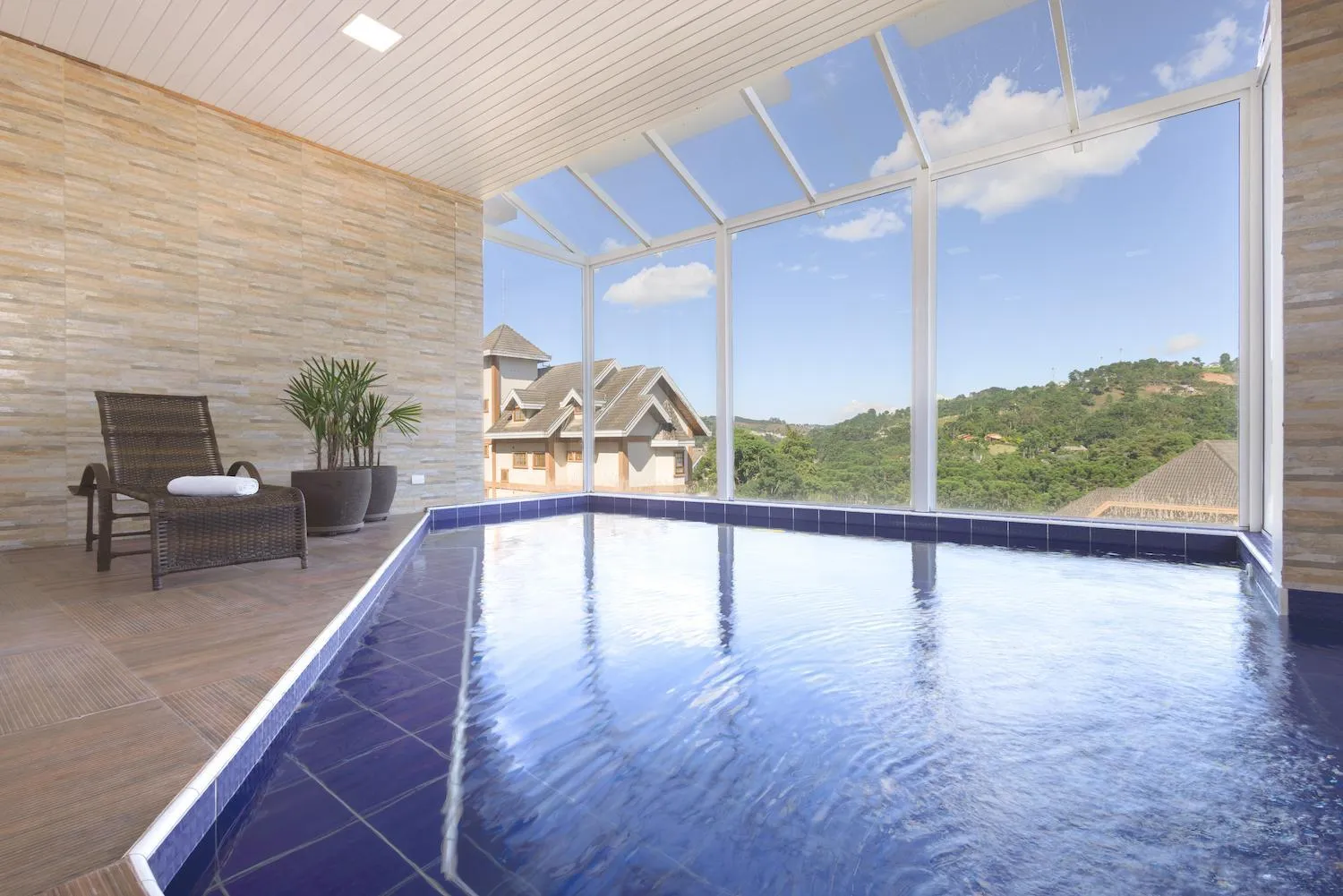 Swimming pool in Kaliman Pousada Campos do Jordão