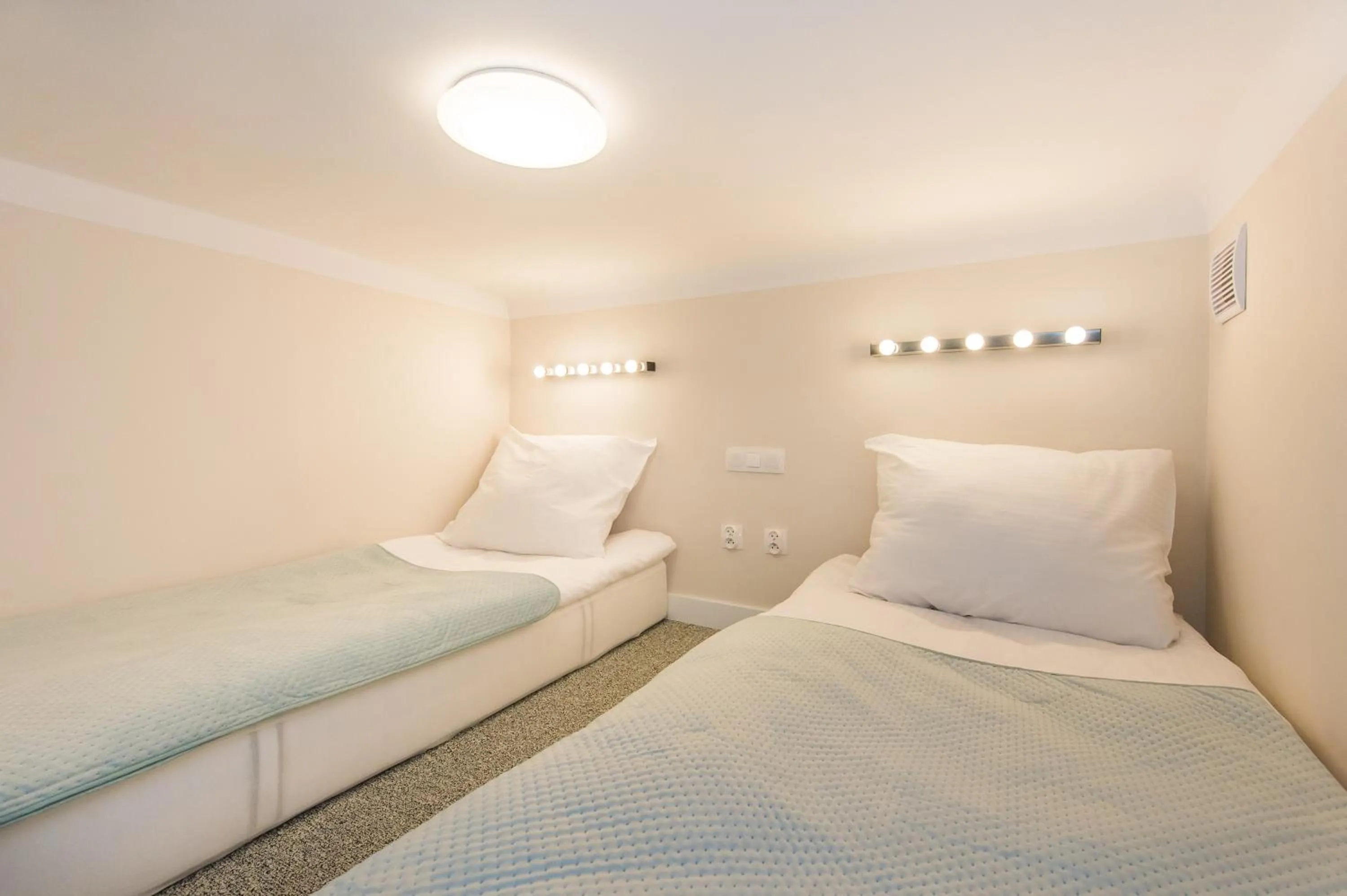 Bed in Bliss Apartments