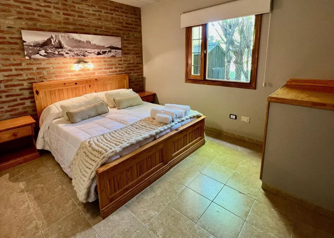 Bed in Del Glaciar Libertador Hotel Bed in Del Glaciar Libertador Hotel