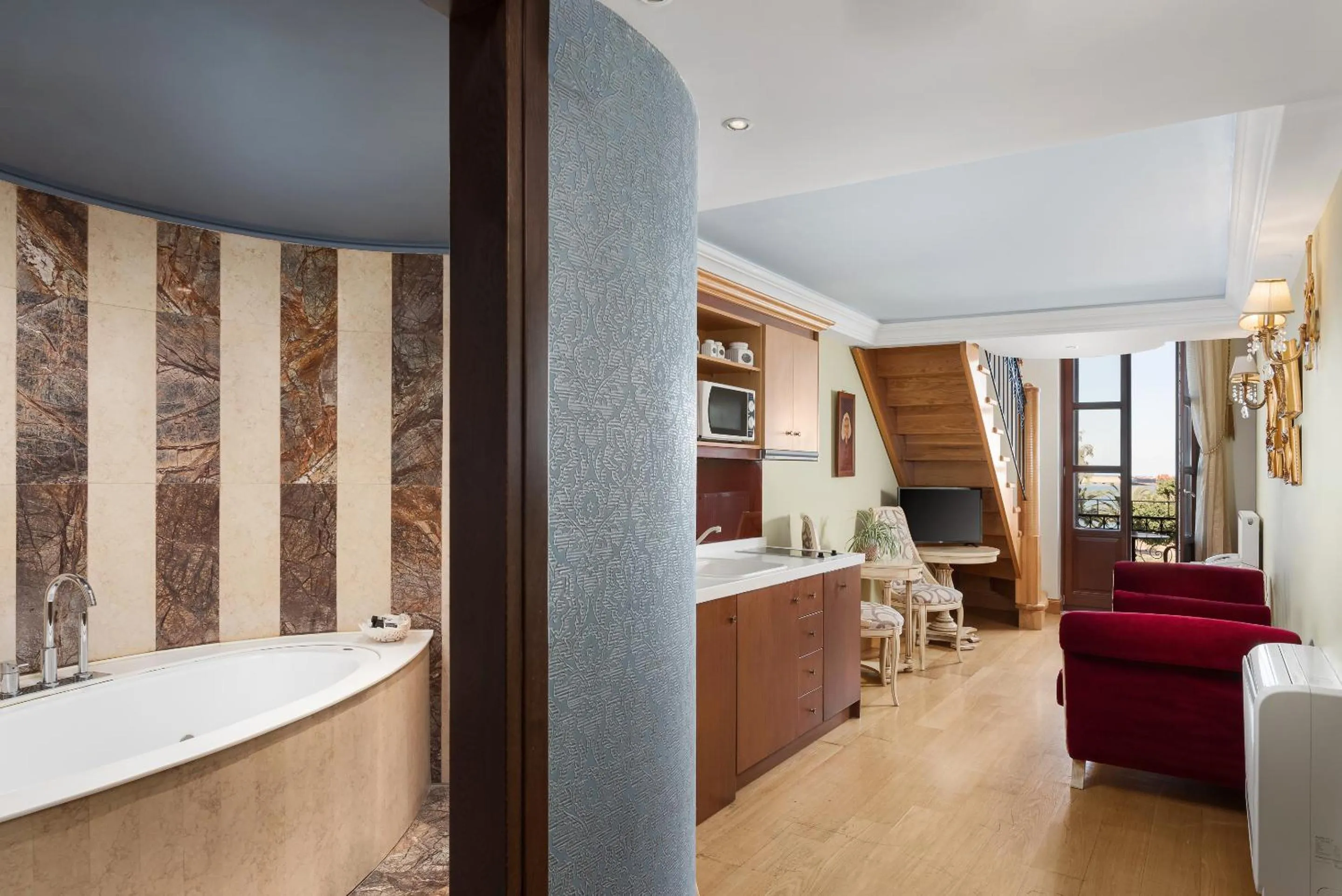 Bed in Civitas Suites Hotel