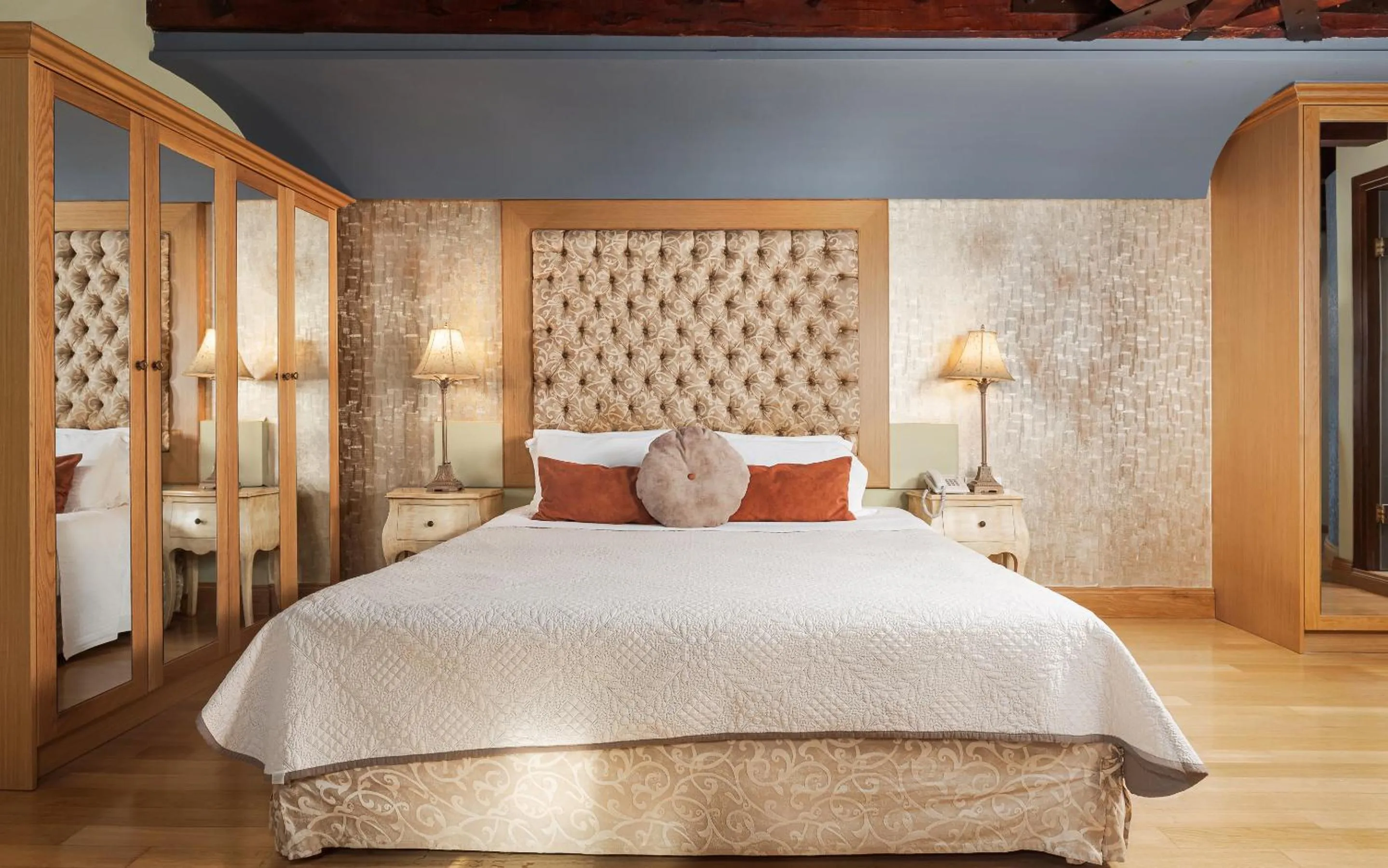 Bed in Civitas Suites Hotel