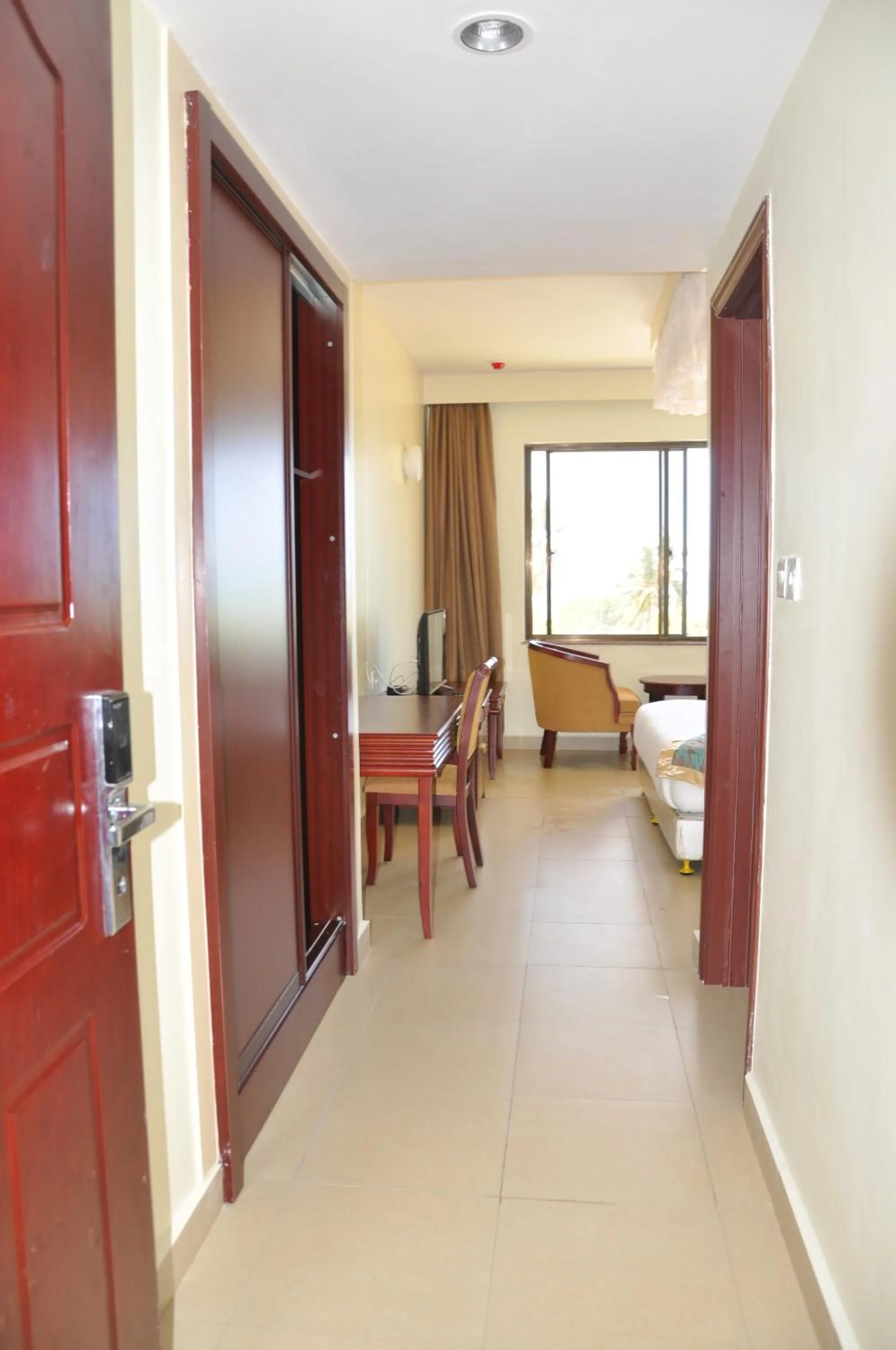 Photo of the whole room, Bed in Luwa Evergreen Hotel