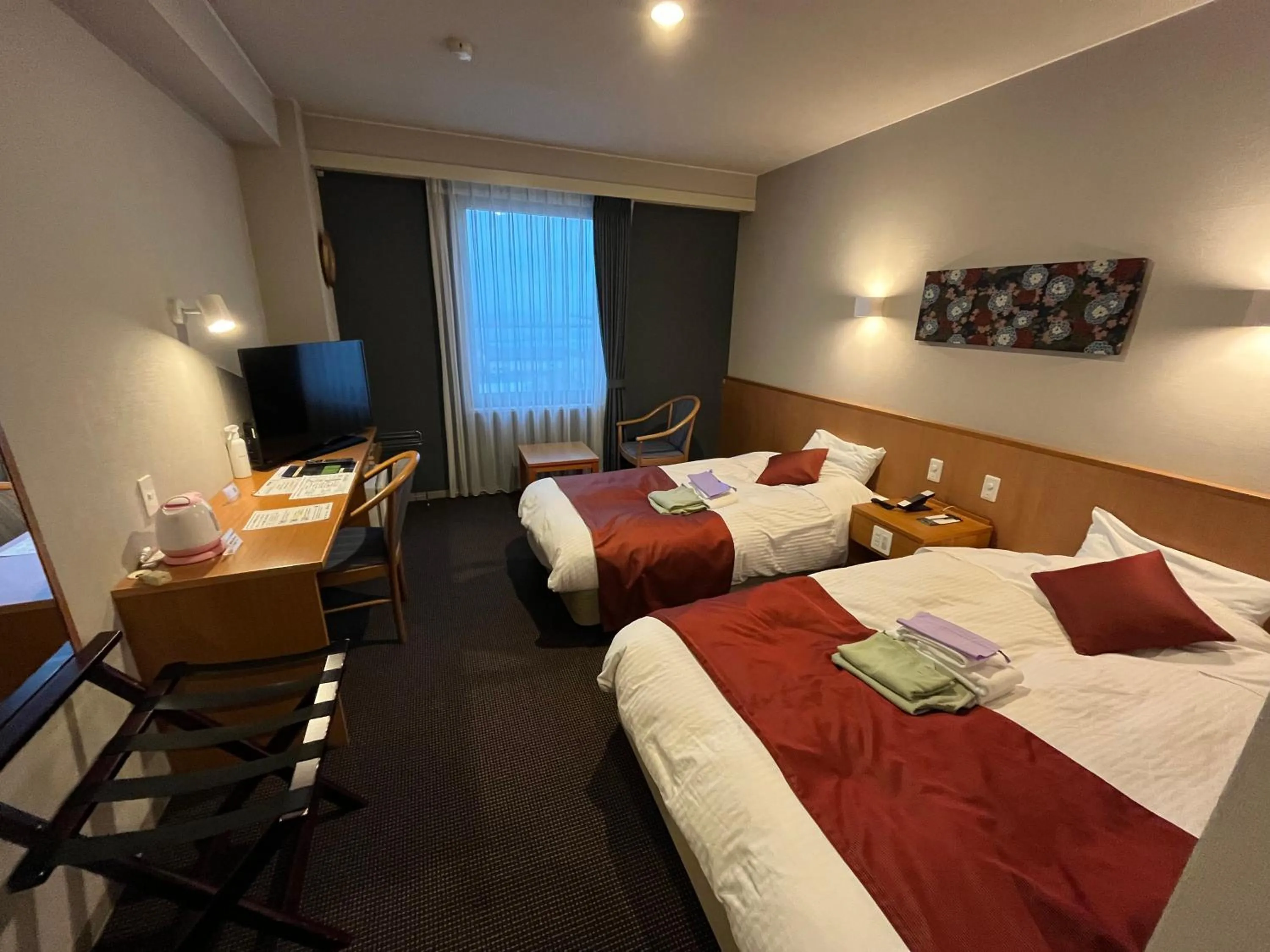 Living room, Bed in Monbetsu Prince Hotel