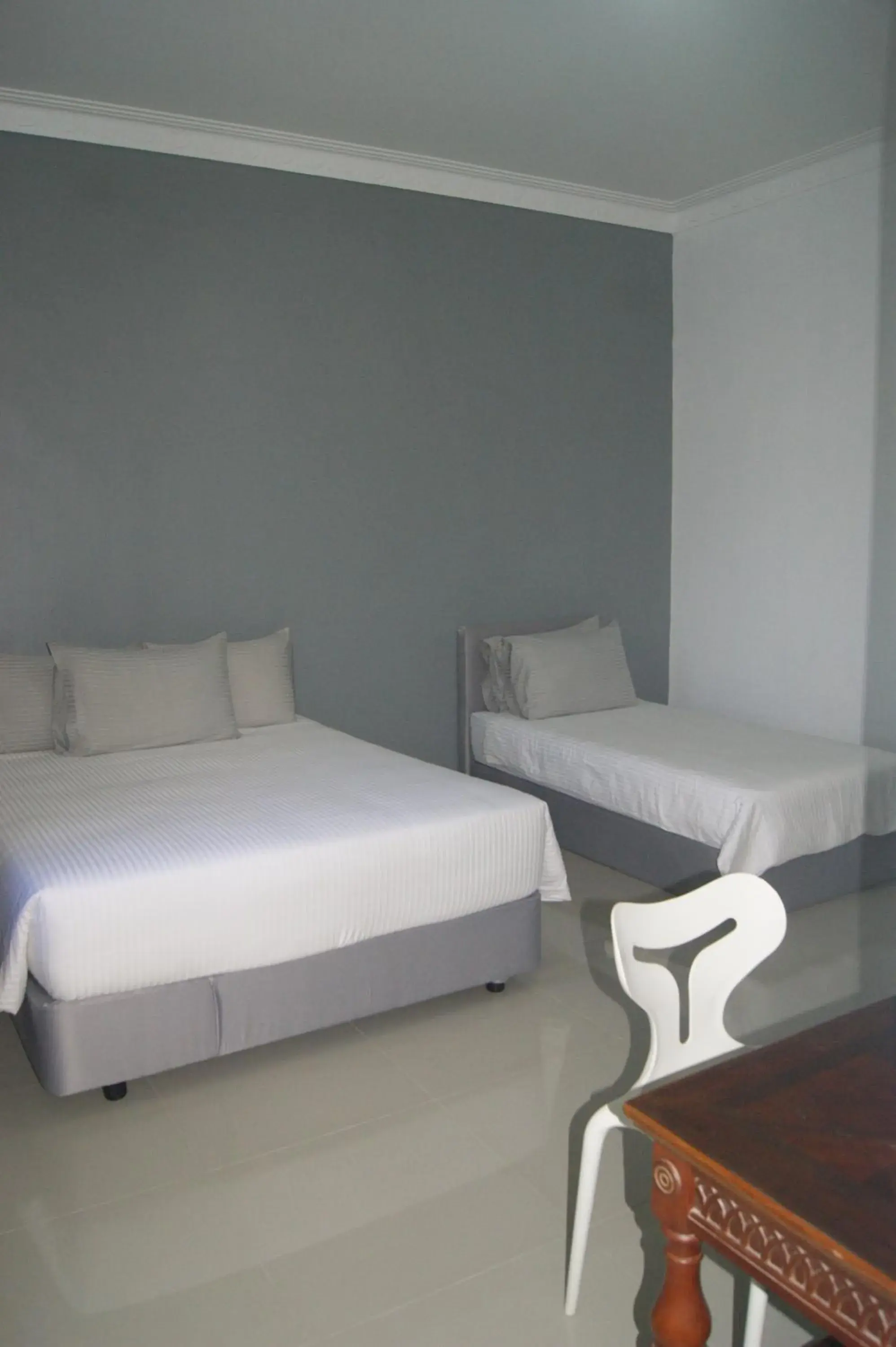 Bed in HOTEL SHAFURA 2
