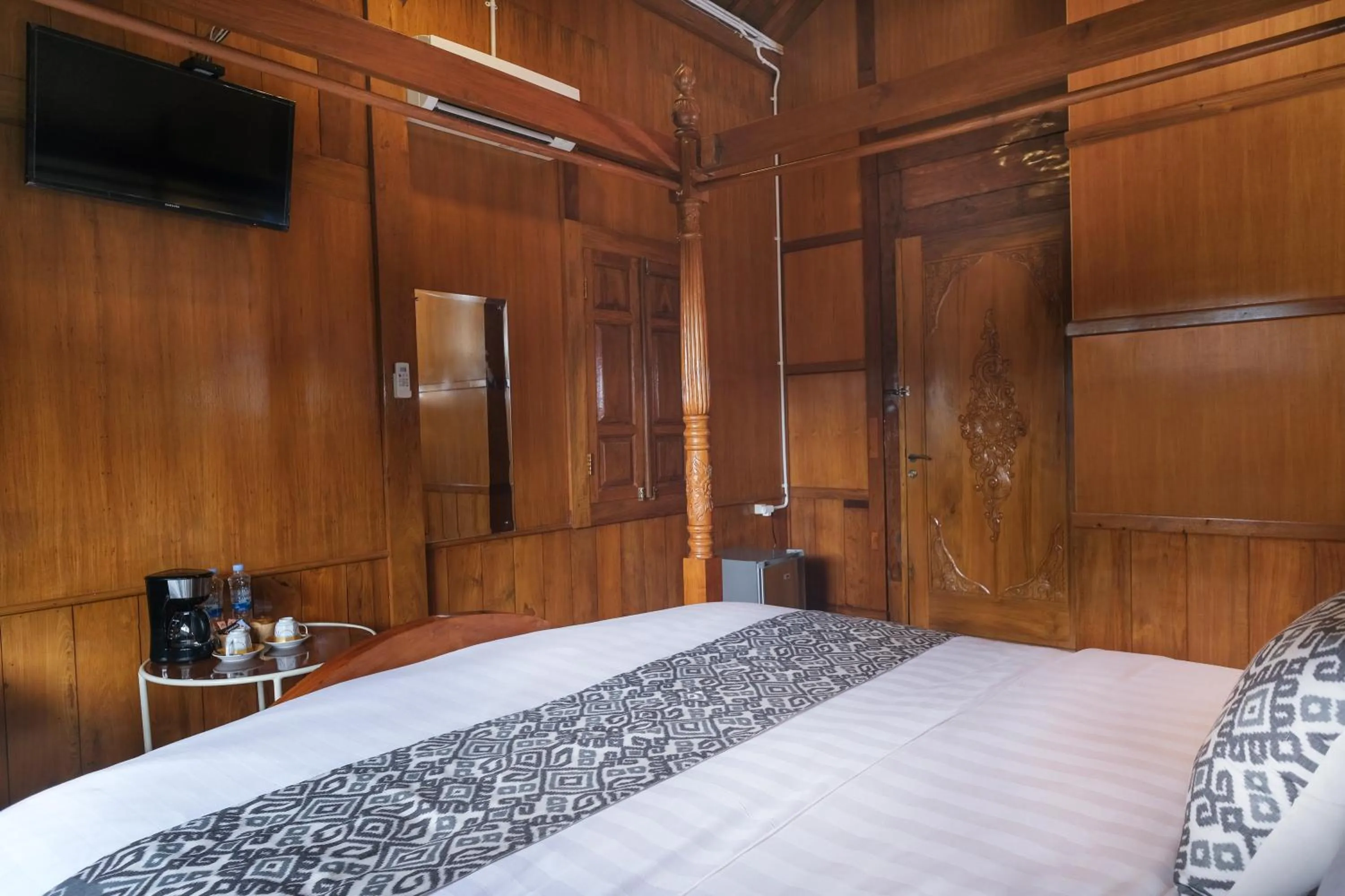 Bed in Kampoeng Joglo Boutique Hotel