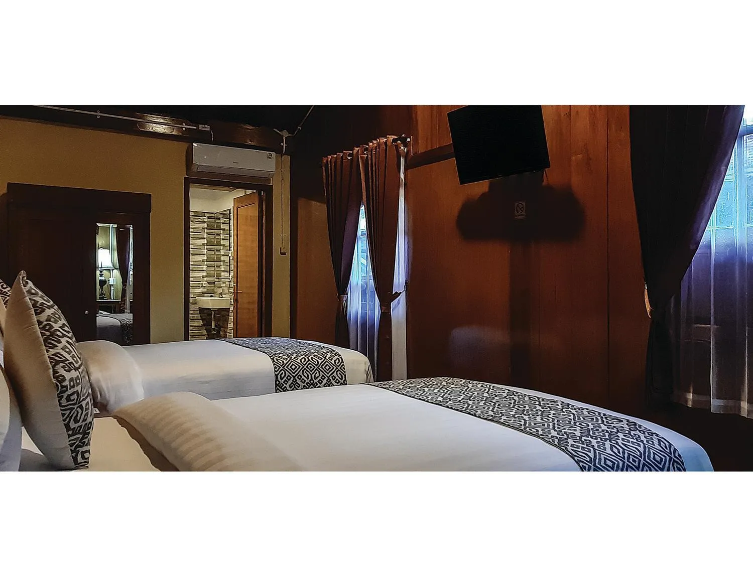 Bed in Kampoeng Joglo Boutique Hotel