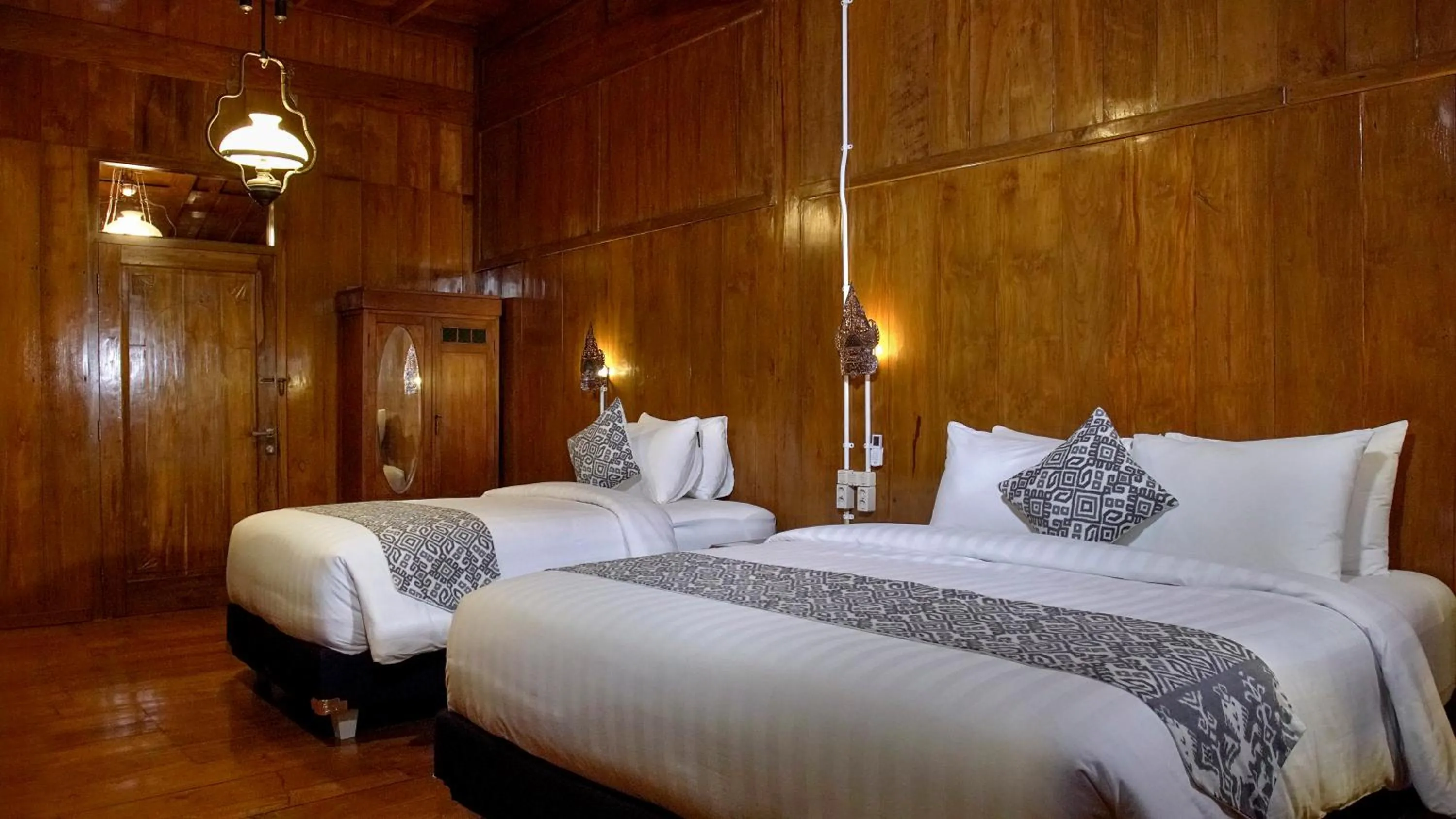 Bed in Kampoeng Joglo Boutique Hotel