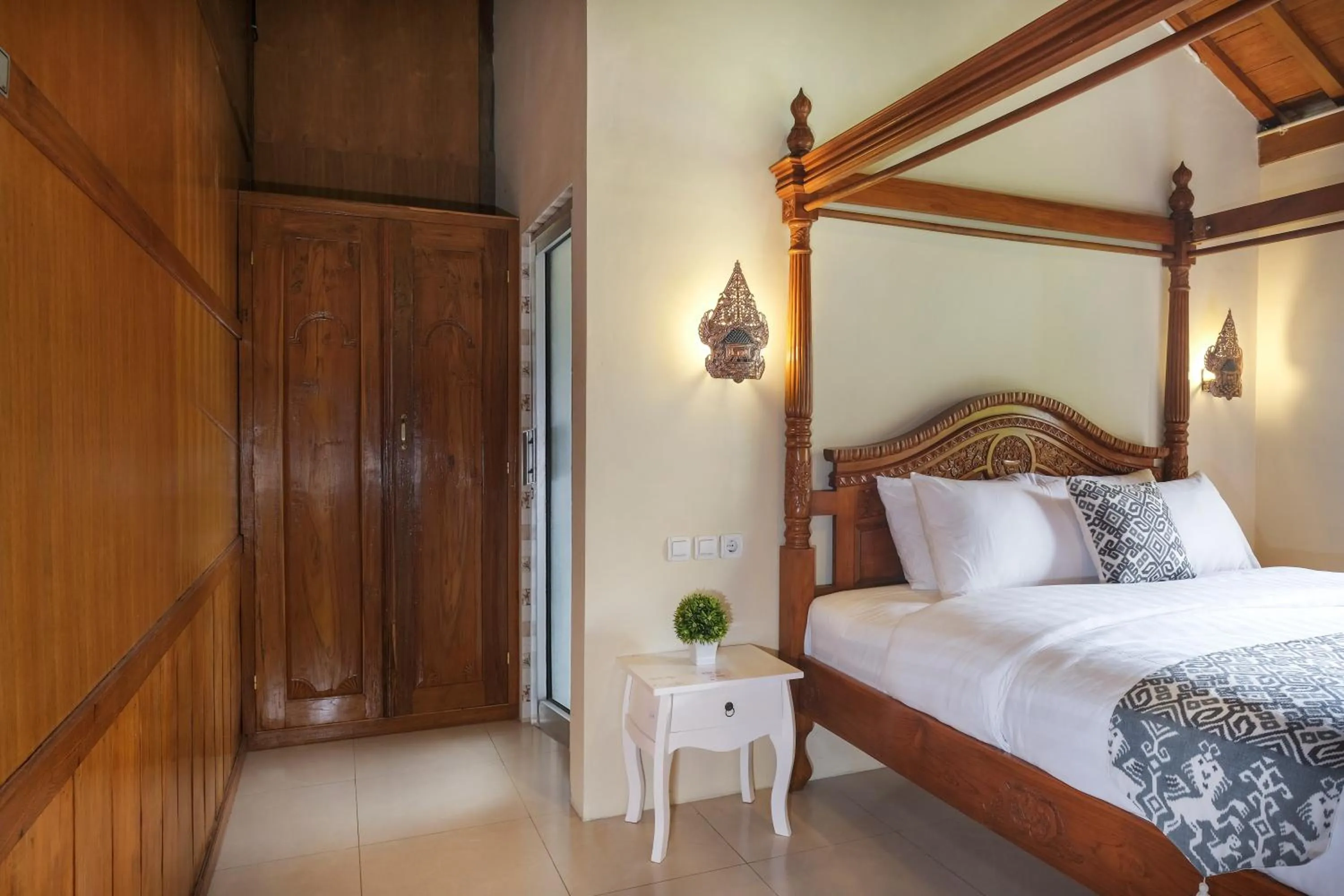 Bed in Kampoeng Joglo Boutique Hotel