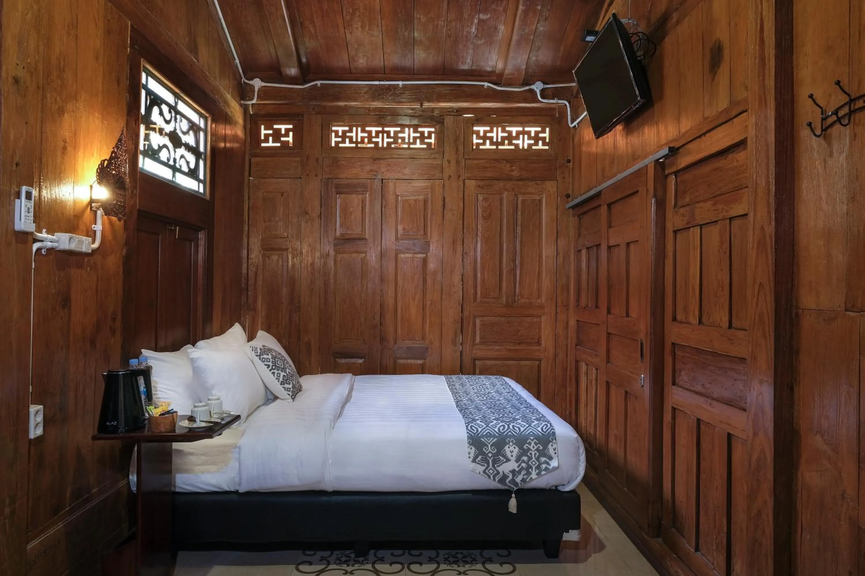 Bed in Kampoeng Joglo Boutique Hotel