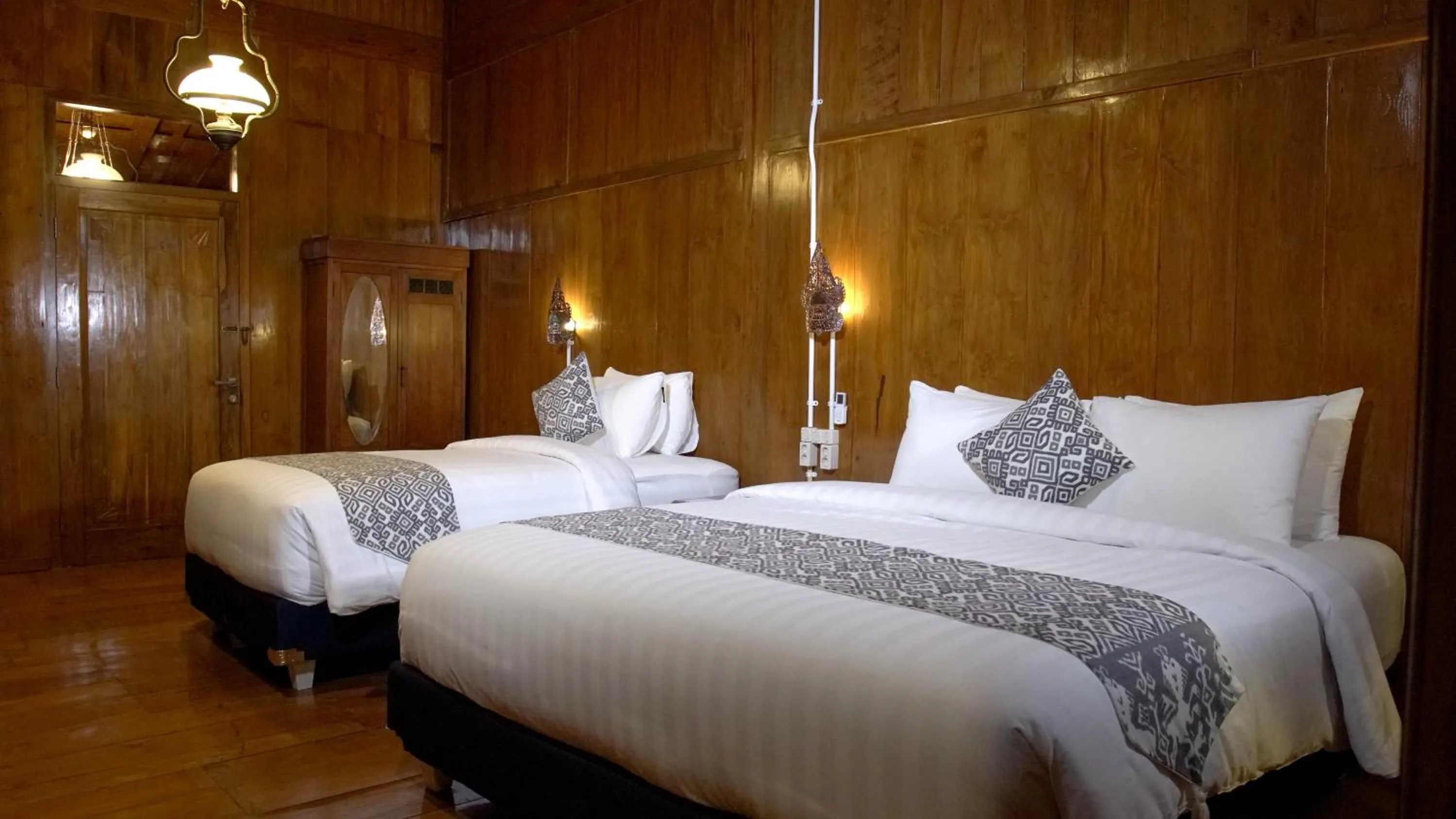 Bed in Kampoeng Joglo Boutique Hotel