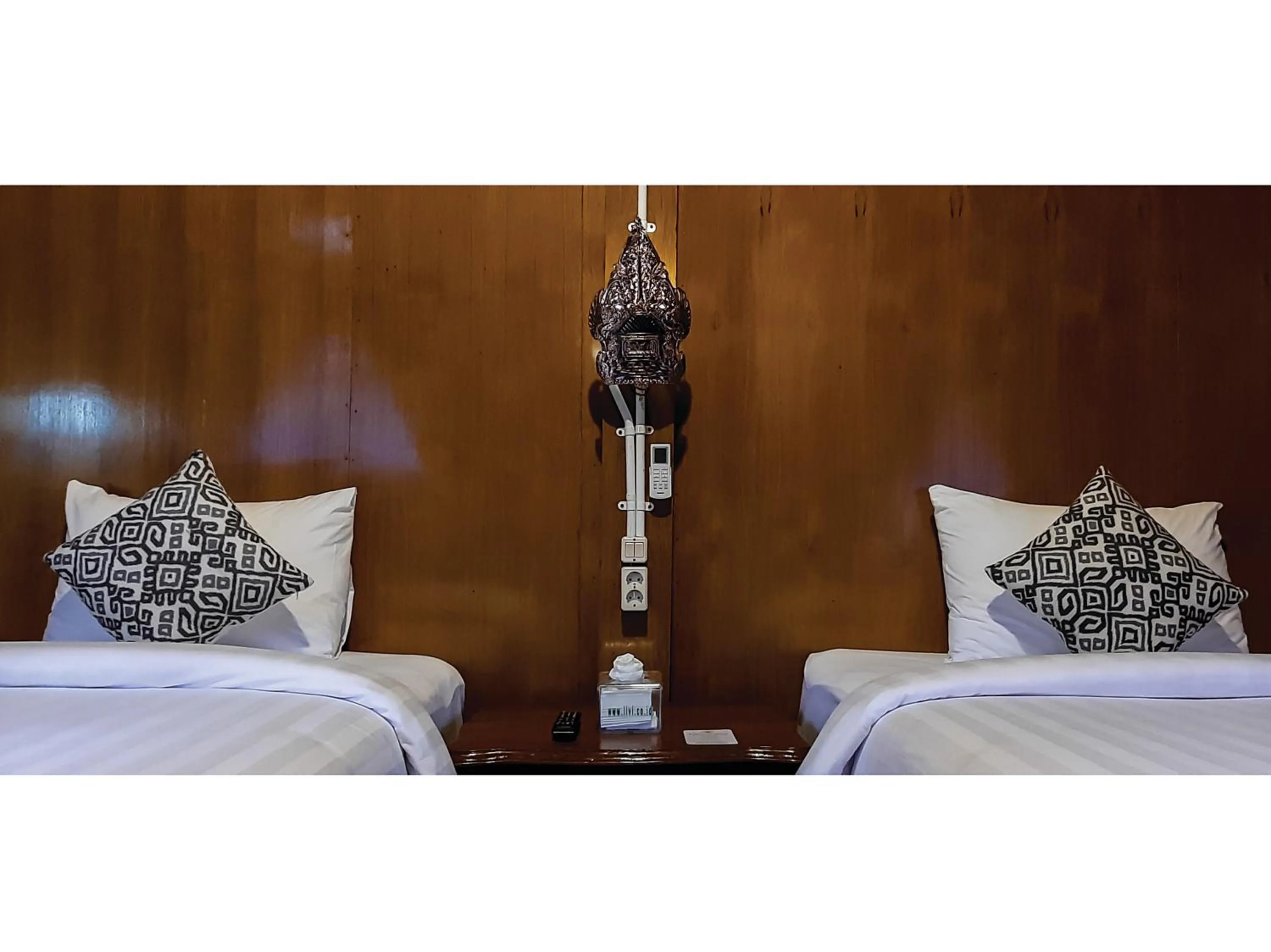 Bed in Kampoeng Joglo Boutique Hotel