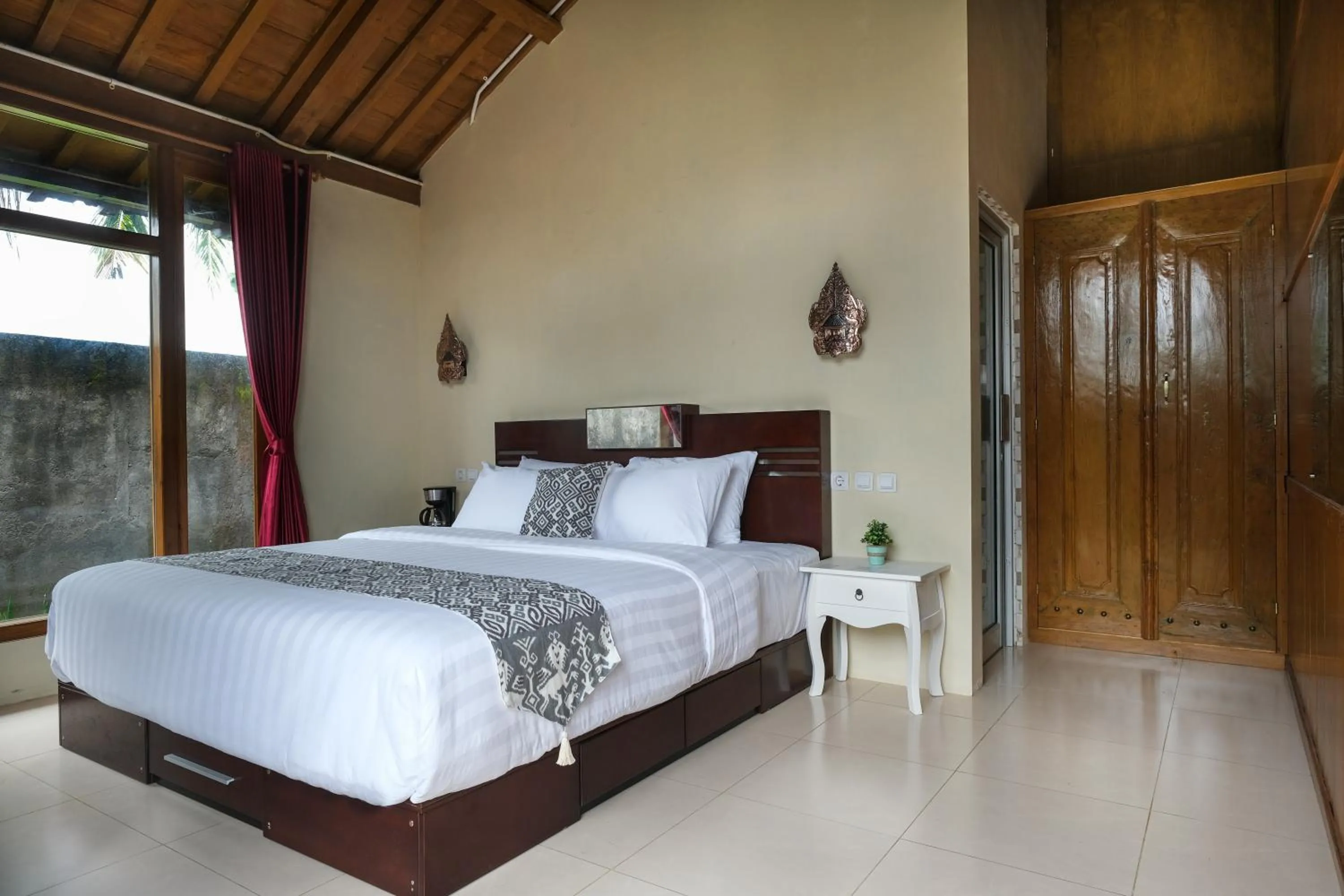 Bed in Kampoeng Joglo Boutique Hotel