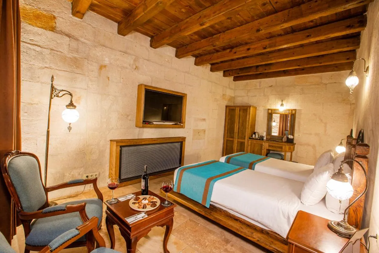 Bed in Imperial Cave Suites & Spa