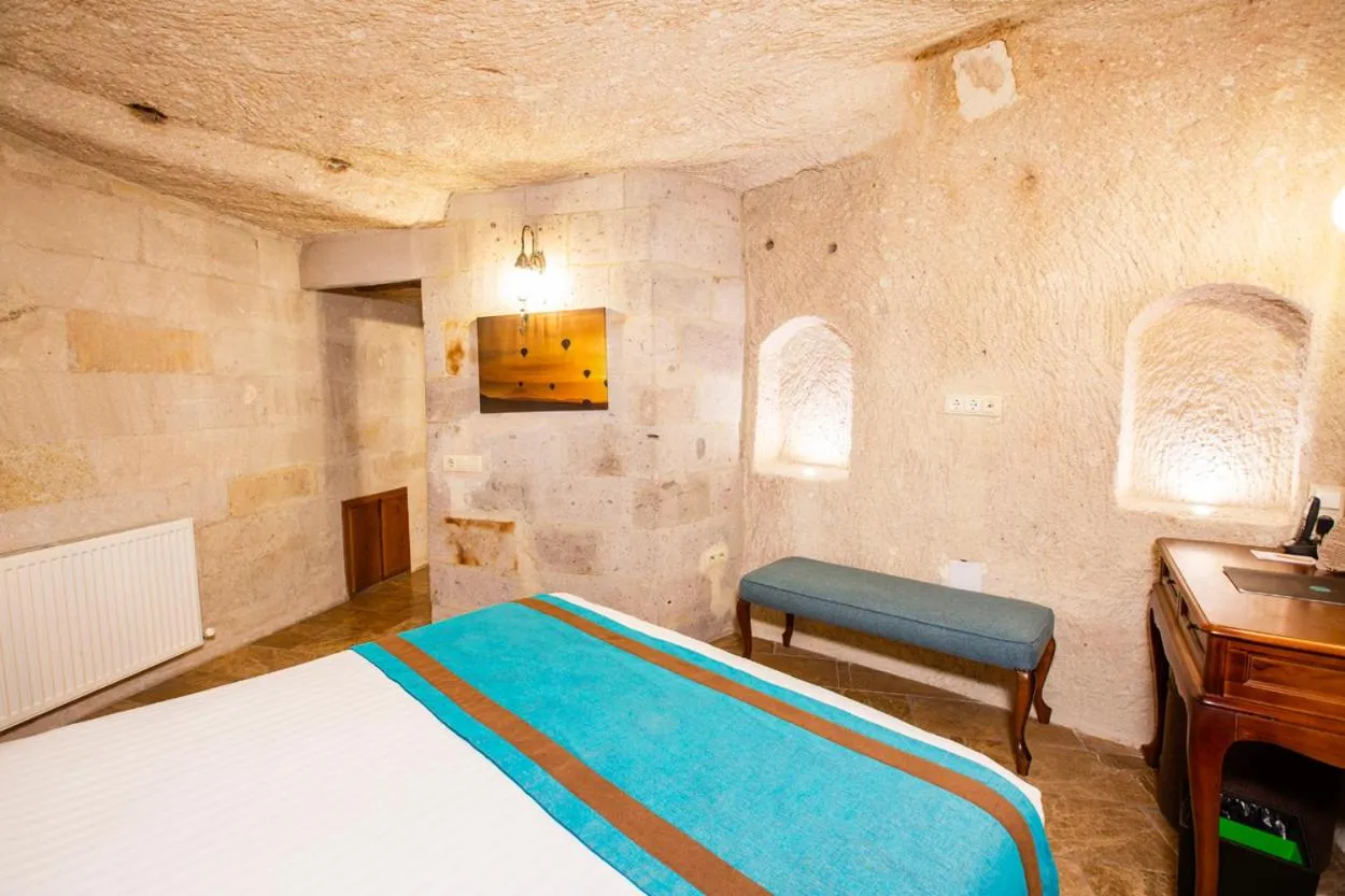 Bed in Imperial Cave Suites & Spa