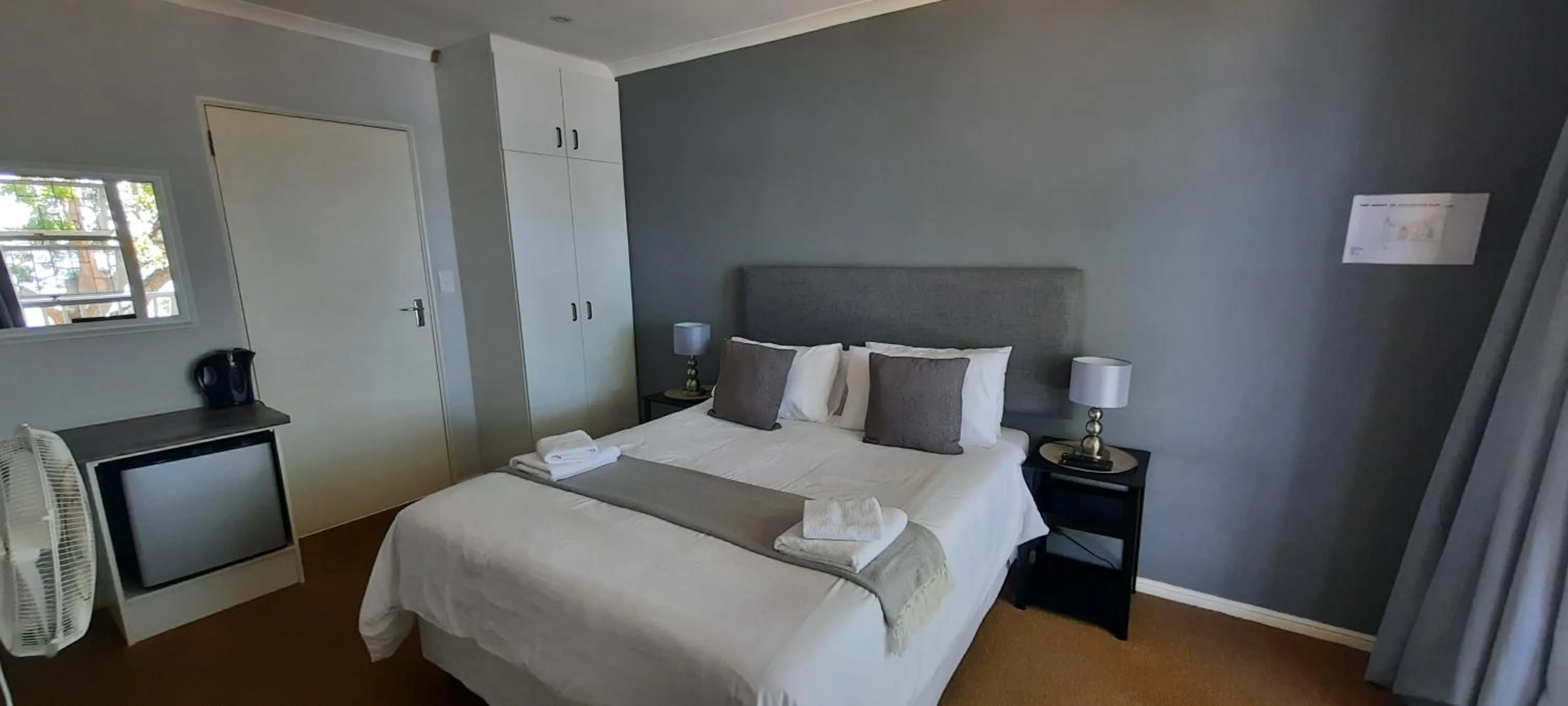 Bed in Phoenix Lodge and Waterside Accommodation