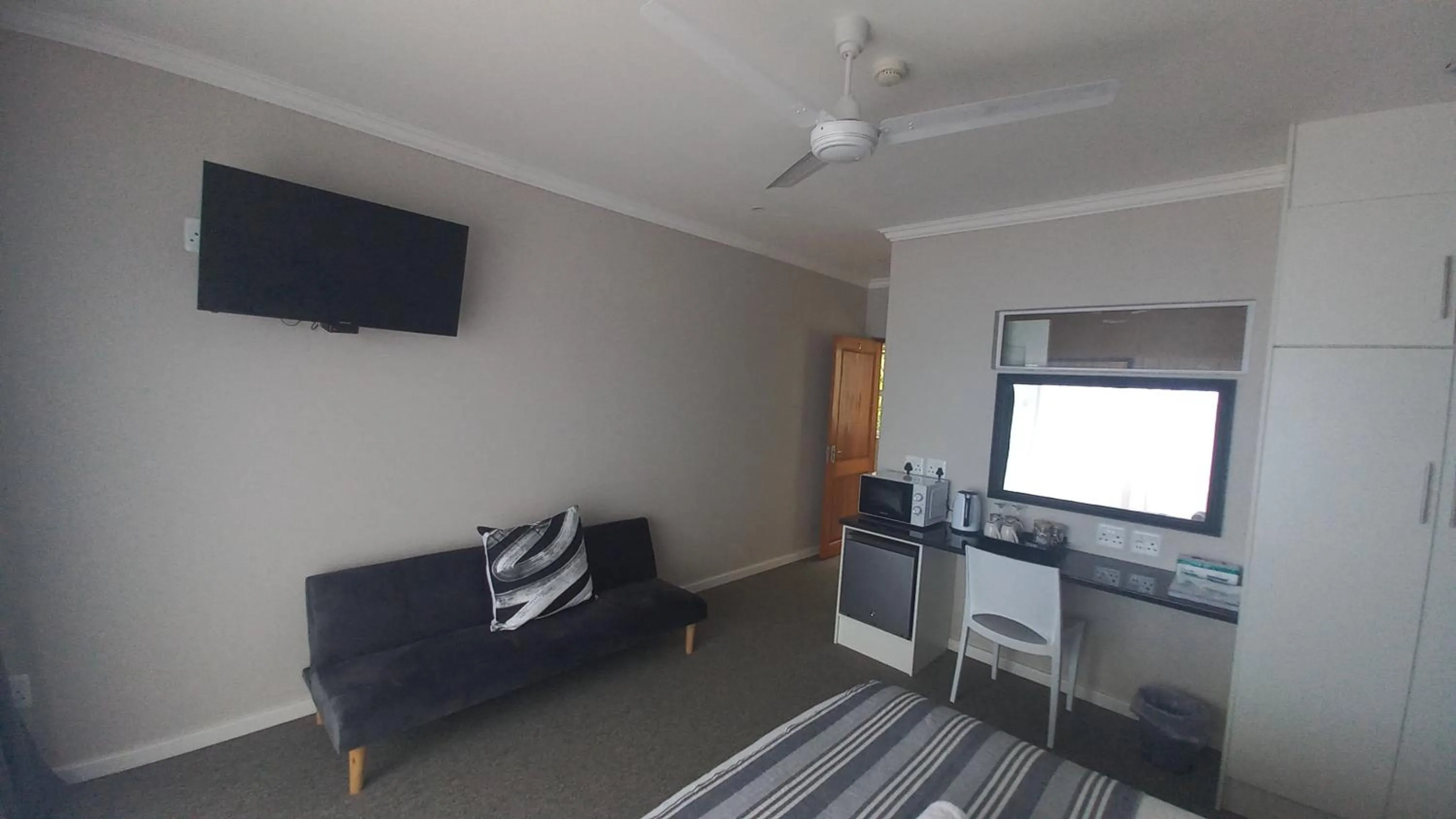 Seating area in Phoenix Lodge and Waterside Accommodation