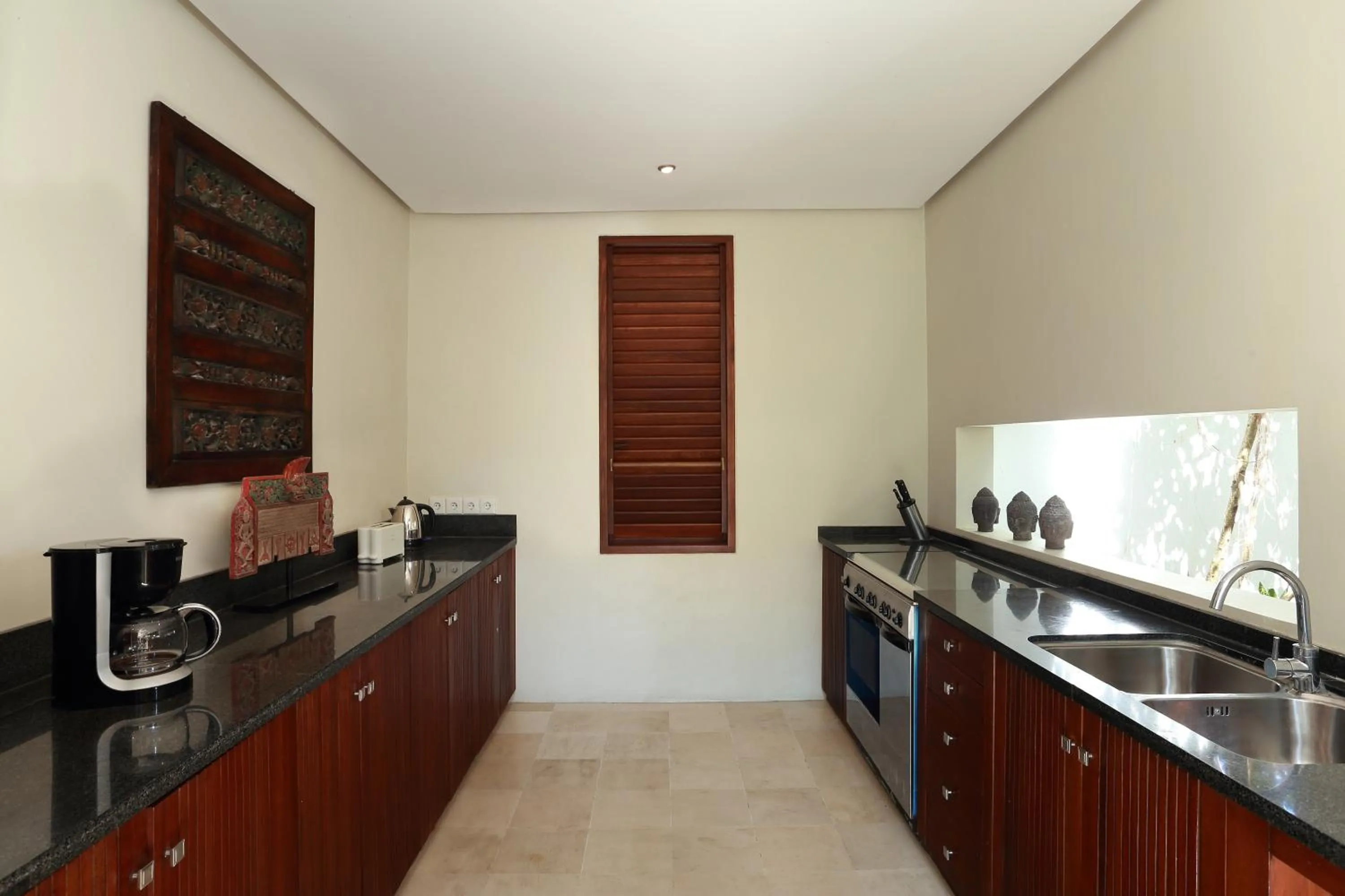 Kitchen or kitchenette in Villa Bali Asri
