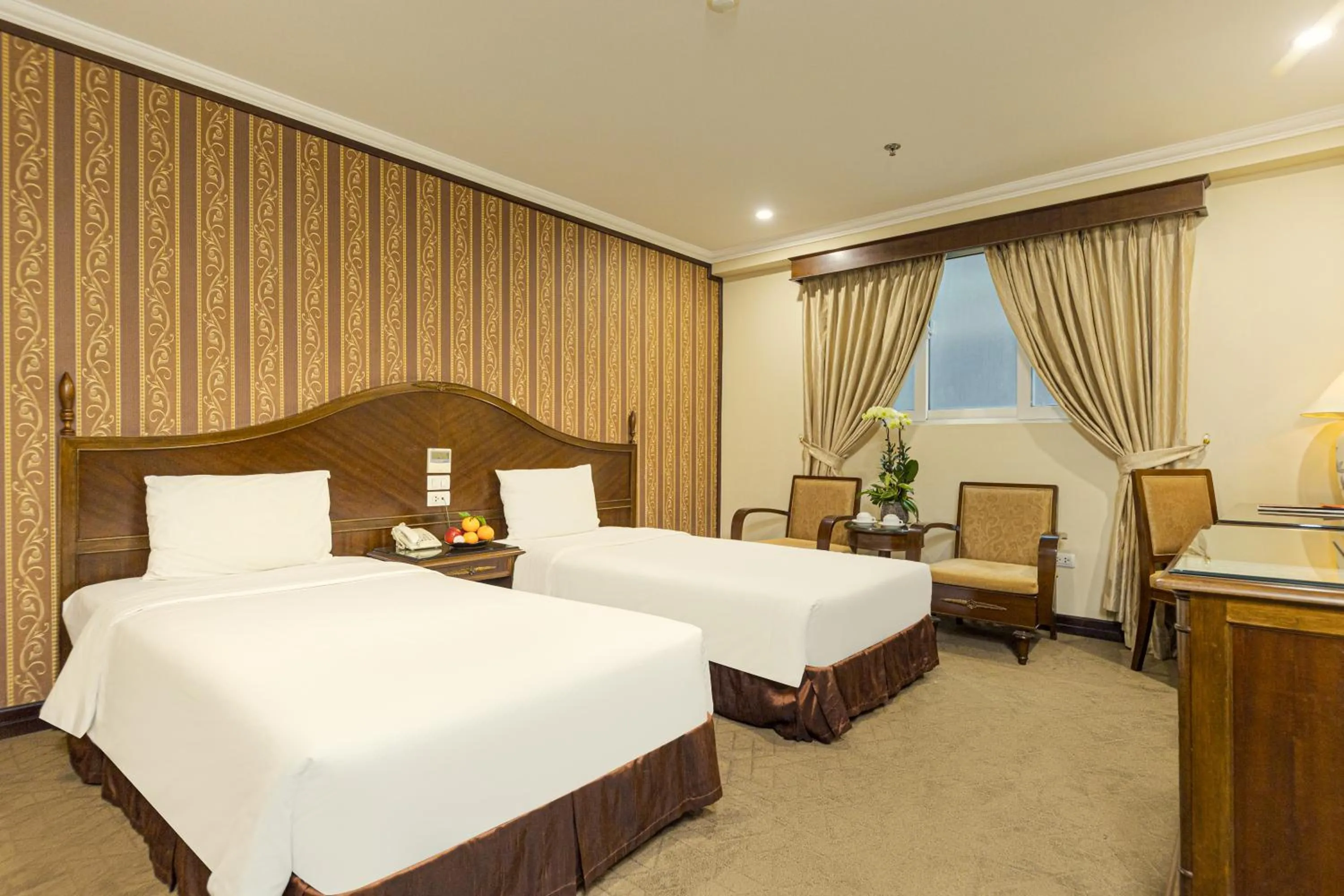 Bed in Chalcedony Grand Hotel