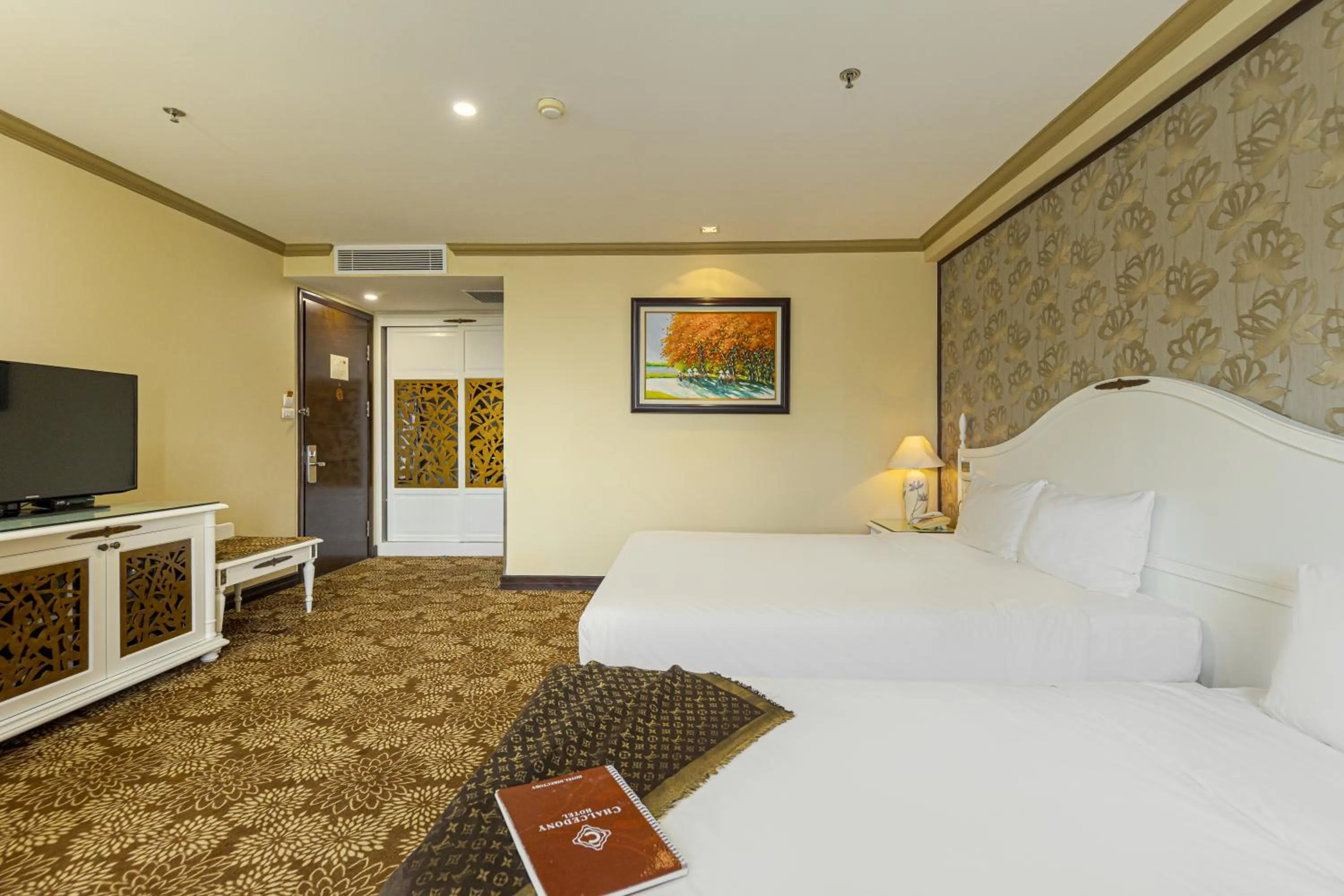 Bed in Chalcedony Grand Hotel