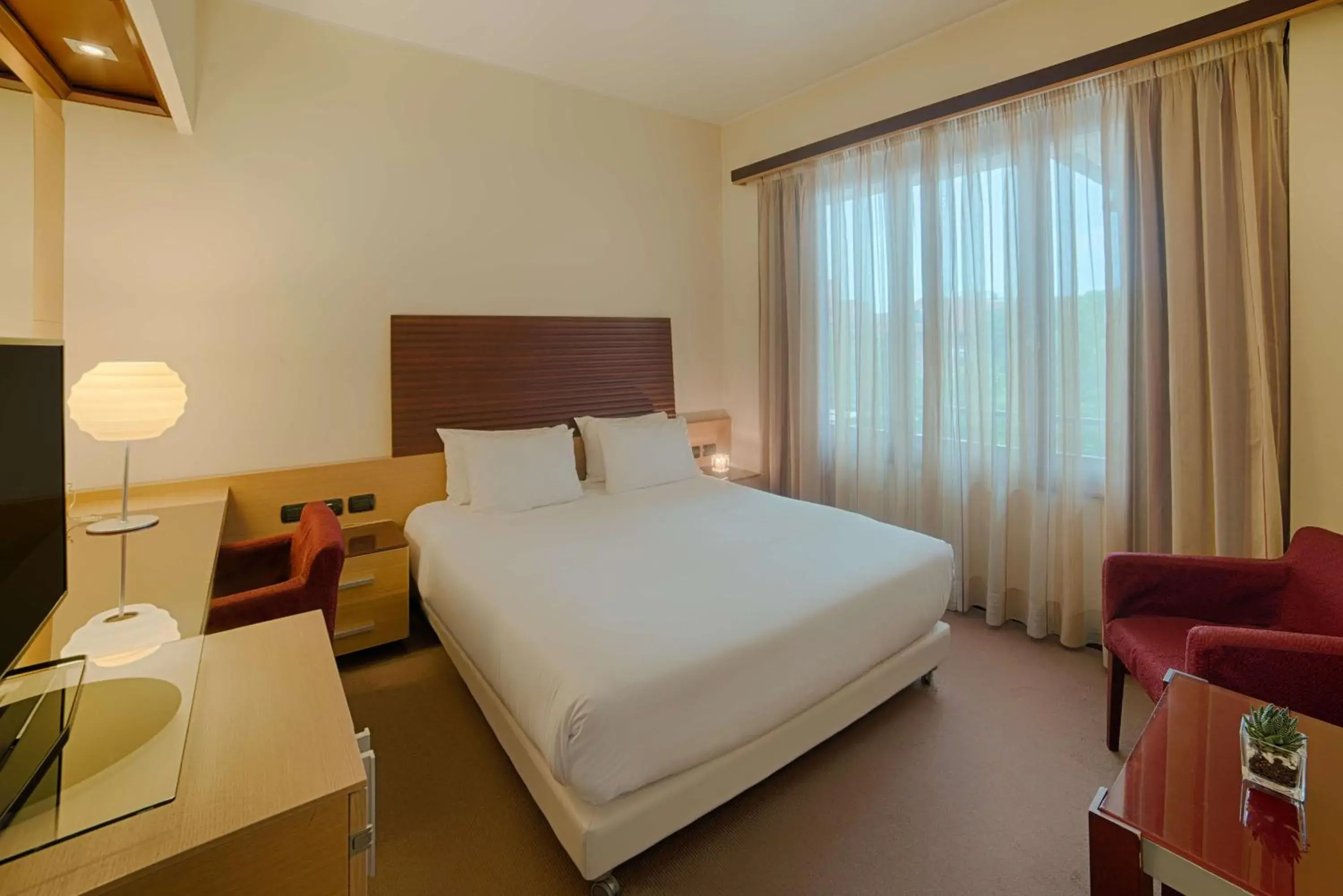 Photo of the whole room, Bed in NH Milano 2 Residence Photo of the whole room, Bed in NH Milano 2 Residence