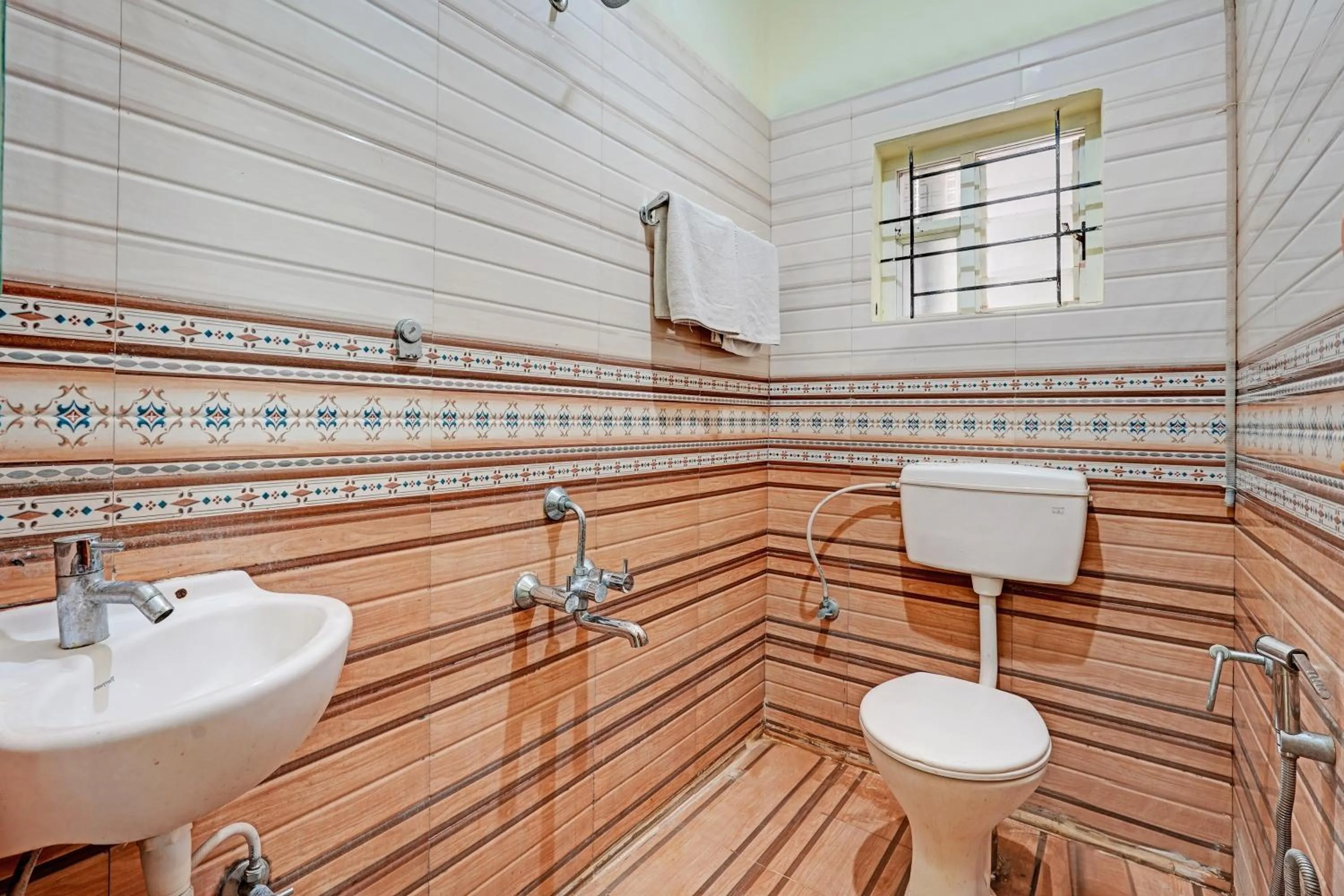 Bathroom in Hotel O New Shelton Suites