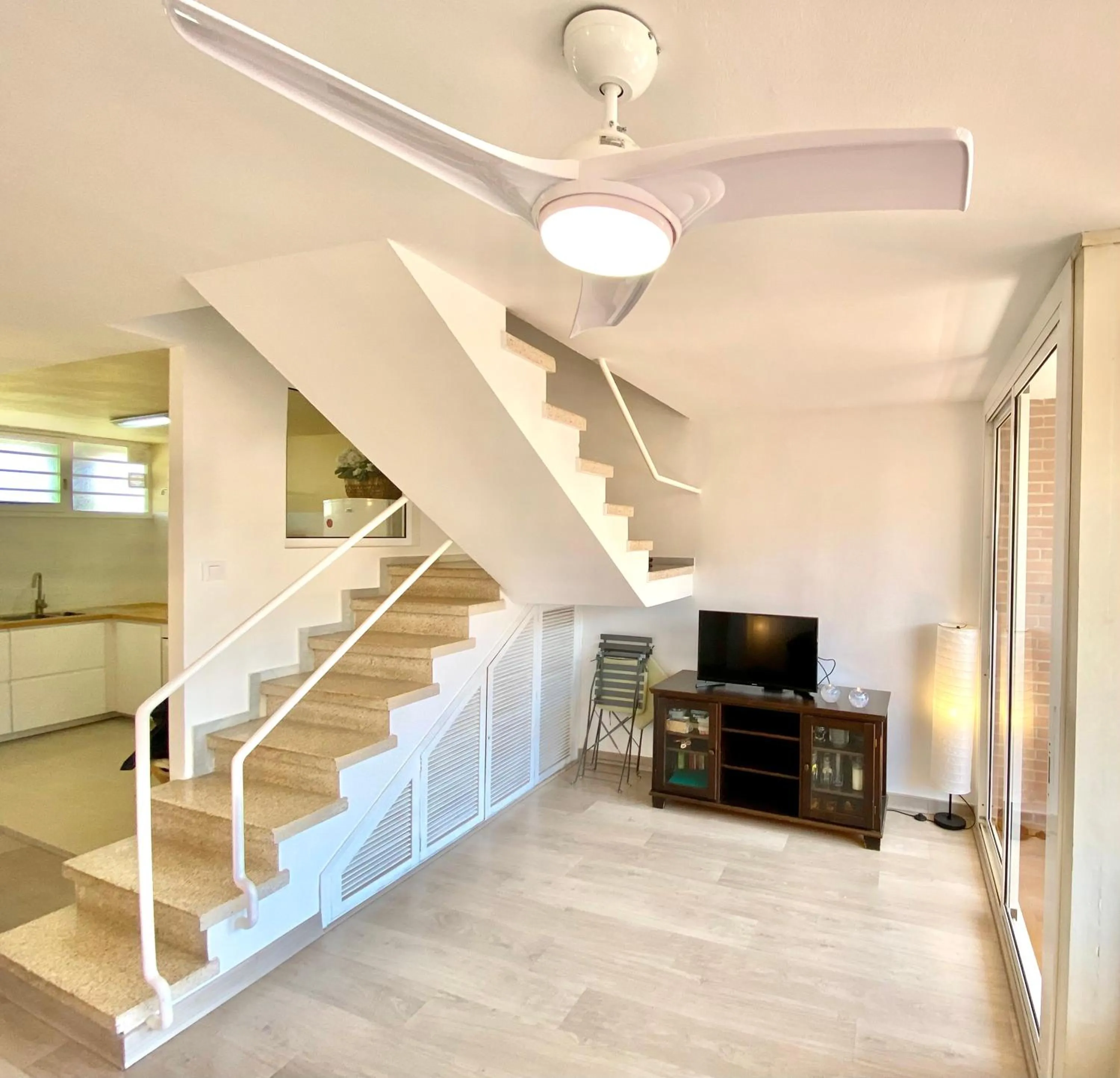 Living room in Sun pool duplex apartment by HLCLUB Agency