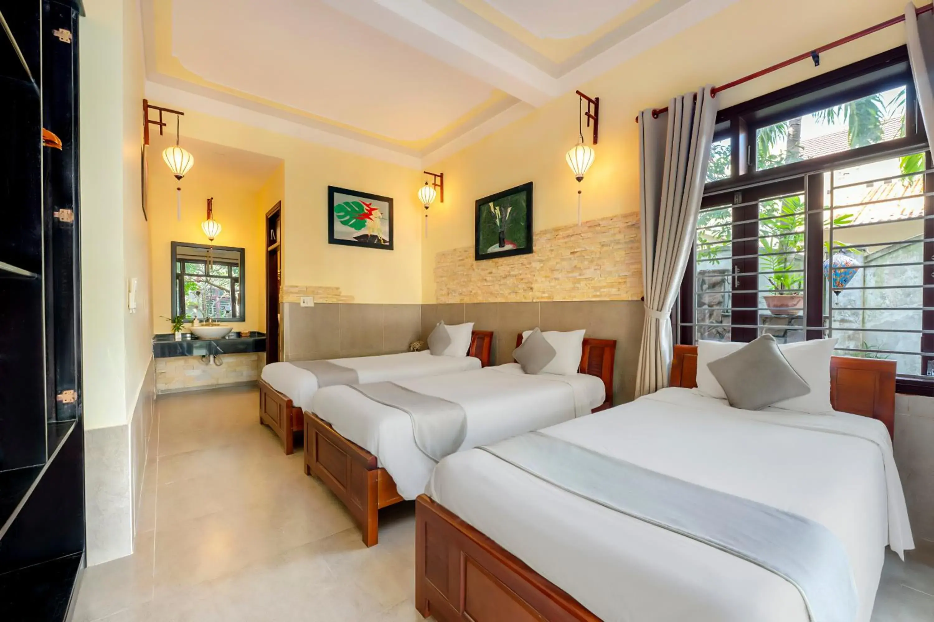 Triple Room with Garden View in Loc Phat Hoi An Homestay Triple Room with Garden View in Loc Phat Hoi An Homestay