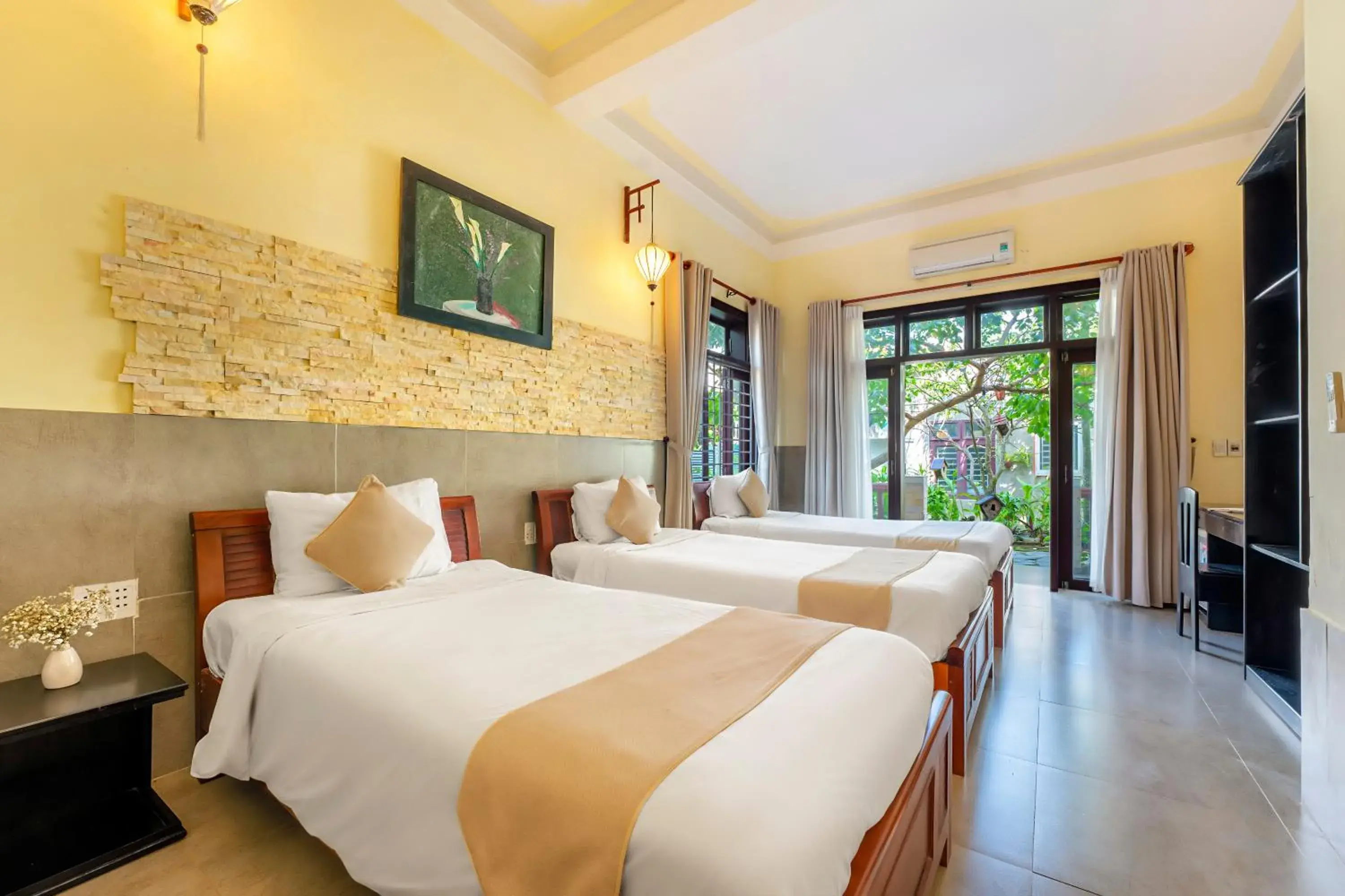 Triple Room with Garden View in Loc Phat Hoi An Homestay Triple Room with Garden View in Loc Phat Hoi An Homestay