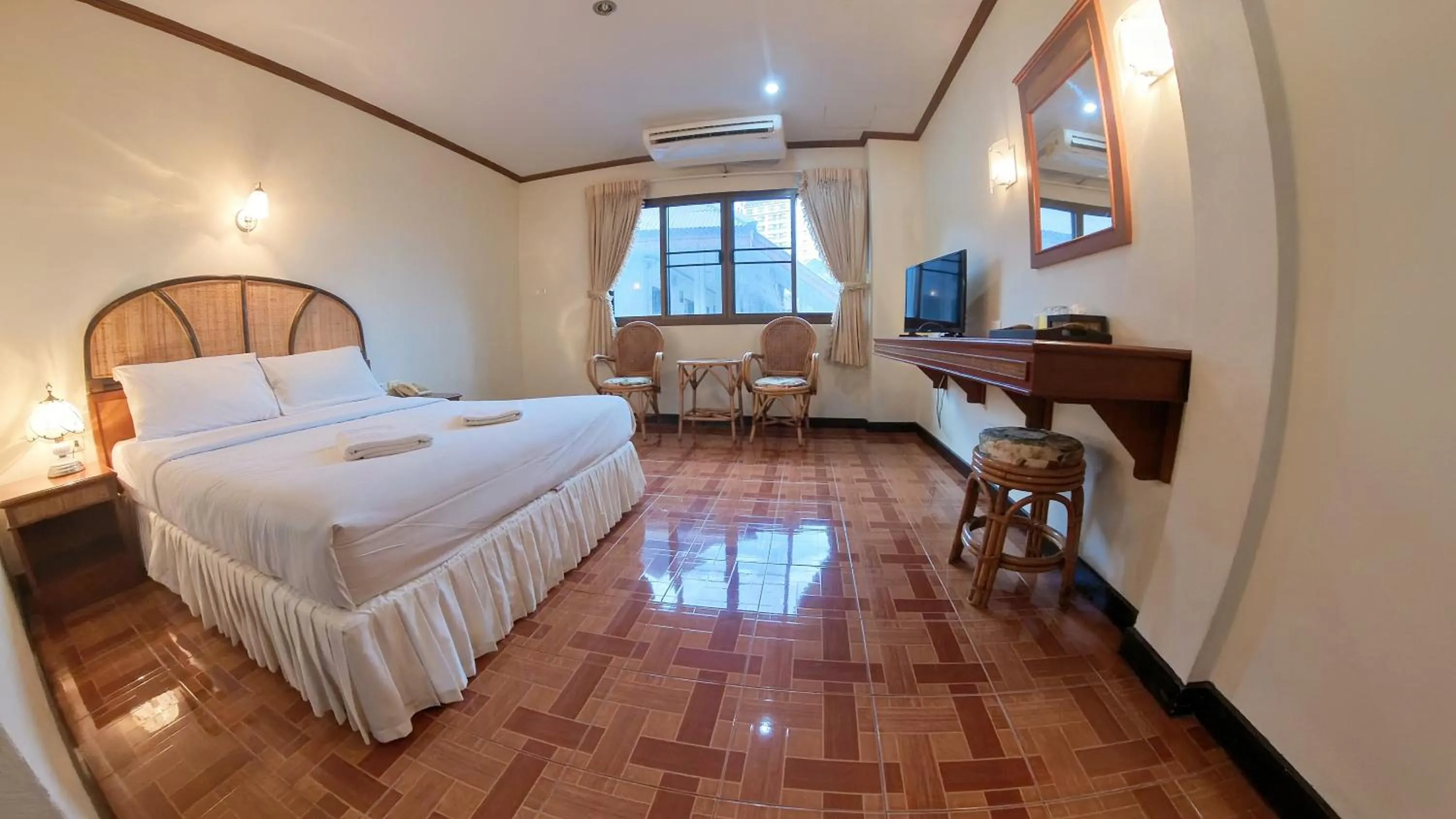 Bed in Roongruang Hotel