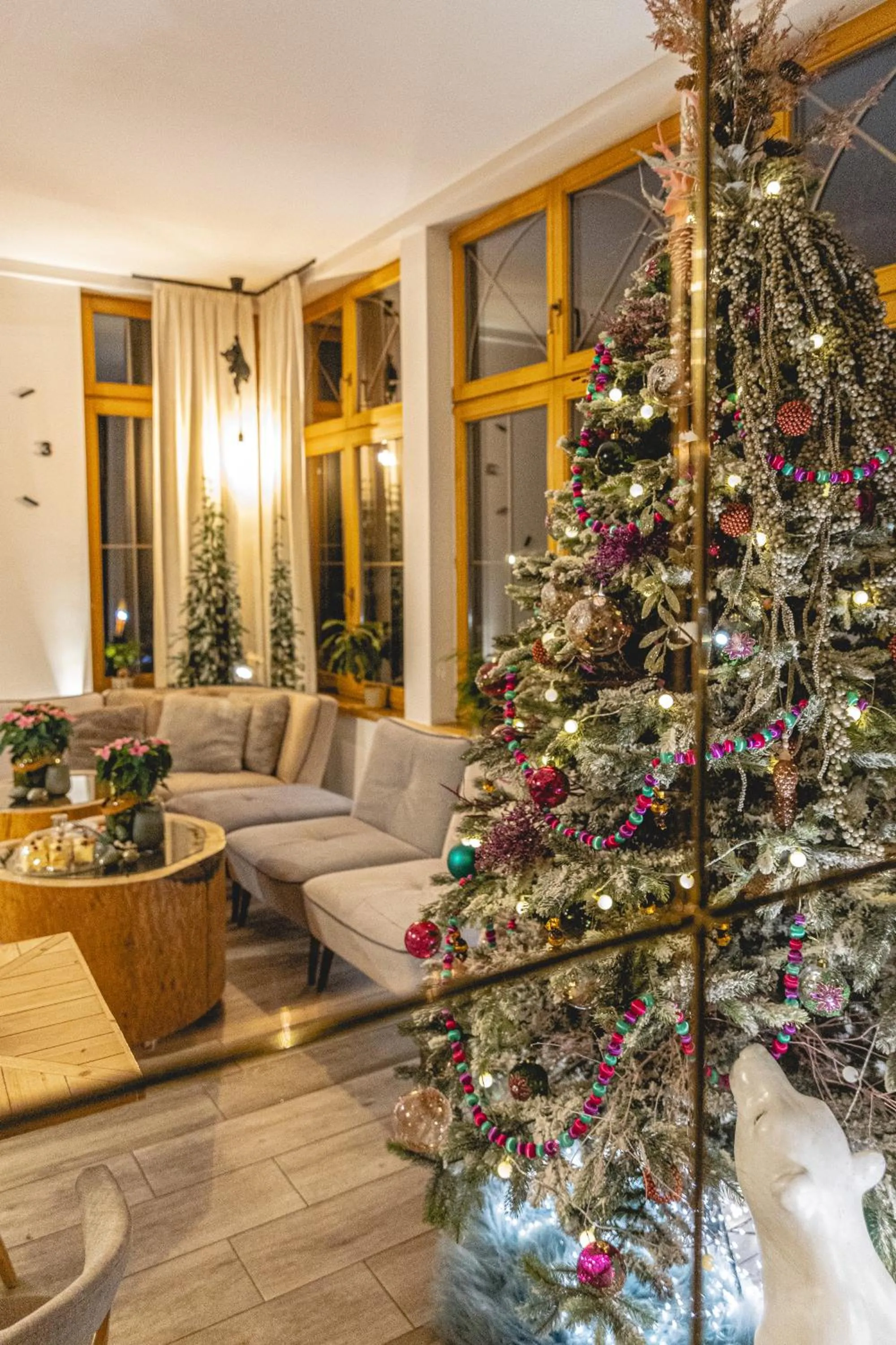 Communal lounge/ TV room in Niedźwiedzia Residence Garden Sauna