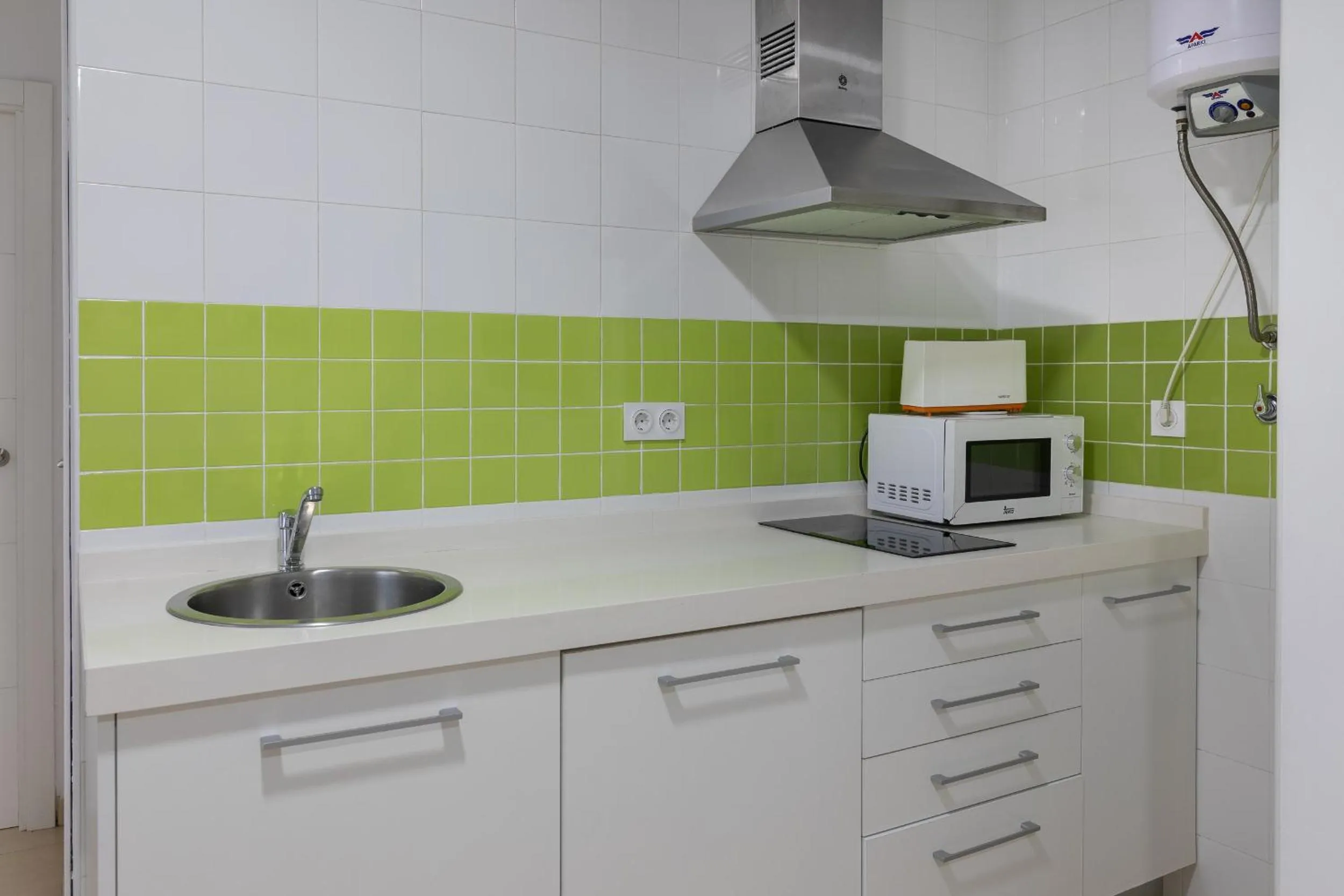 Kitchen or kitchenette in Reservaloen Plaza del Salvador