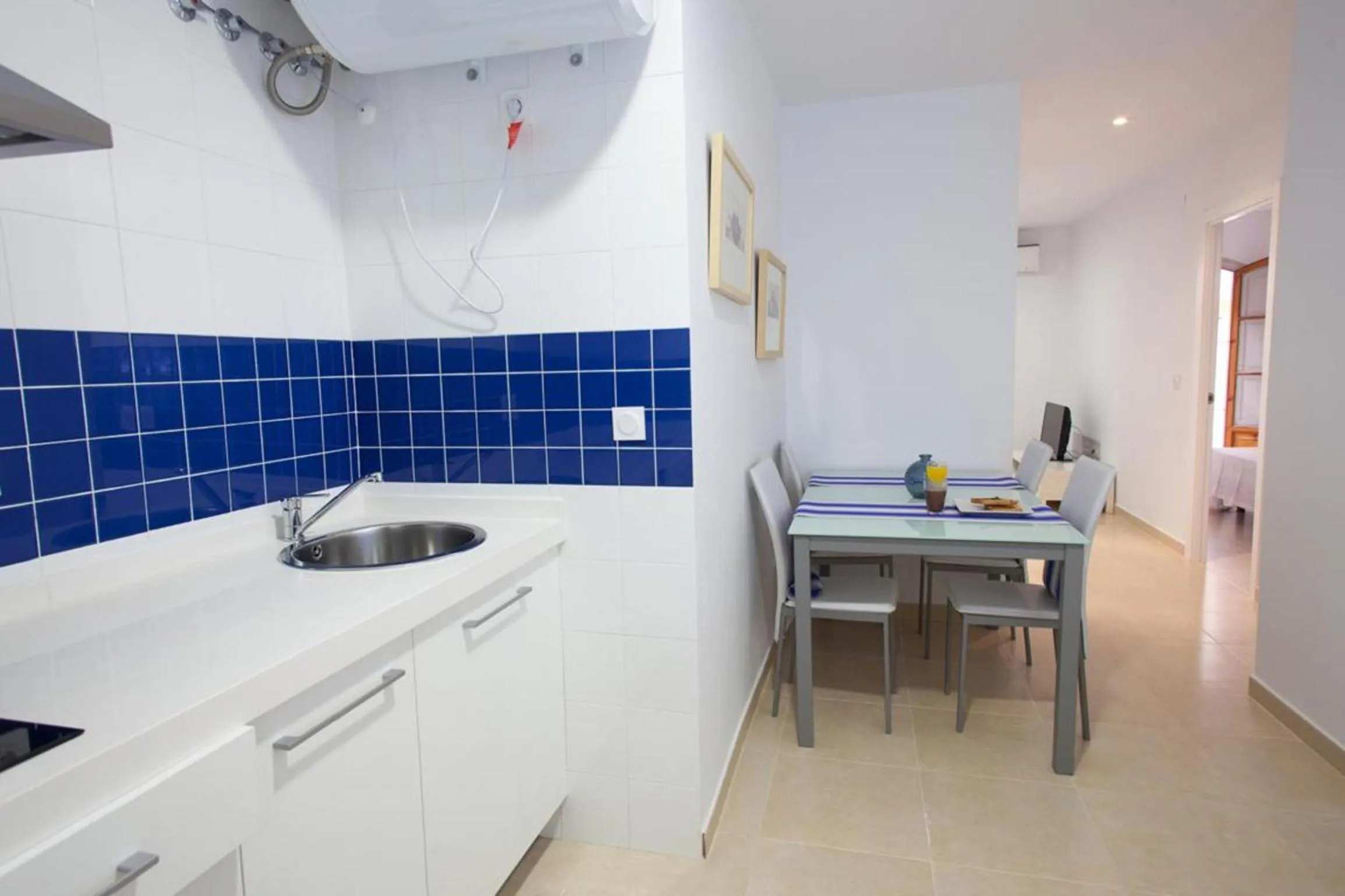 Kitchen or kitchenette in Reservaloen Plaza del Salvador