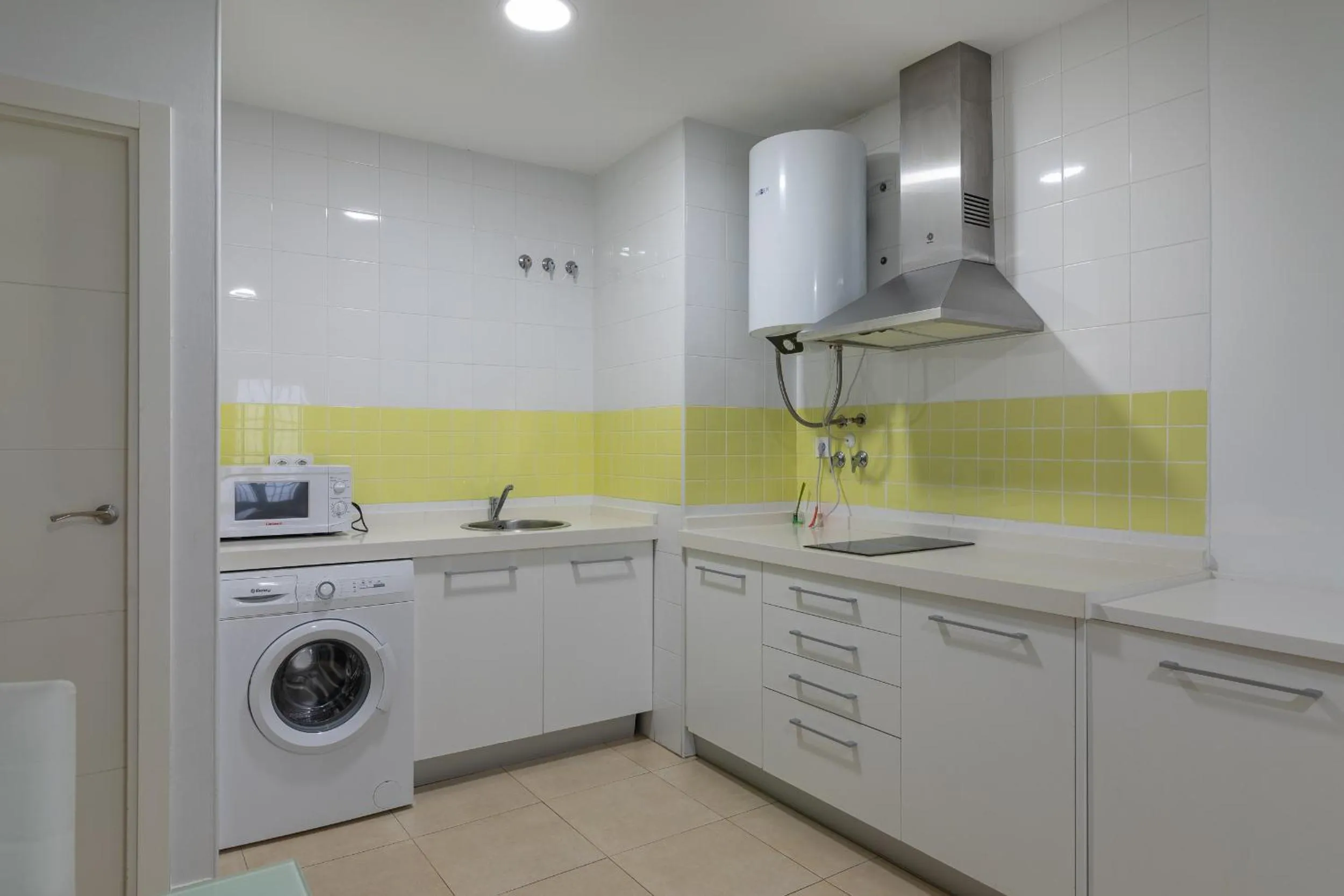 Kitchen or kitchenette in Reservaloen Plaza del Salvador