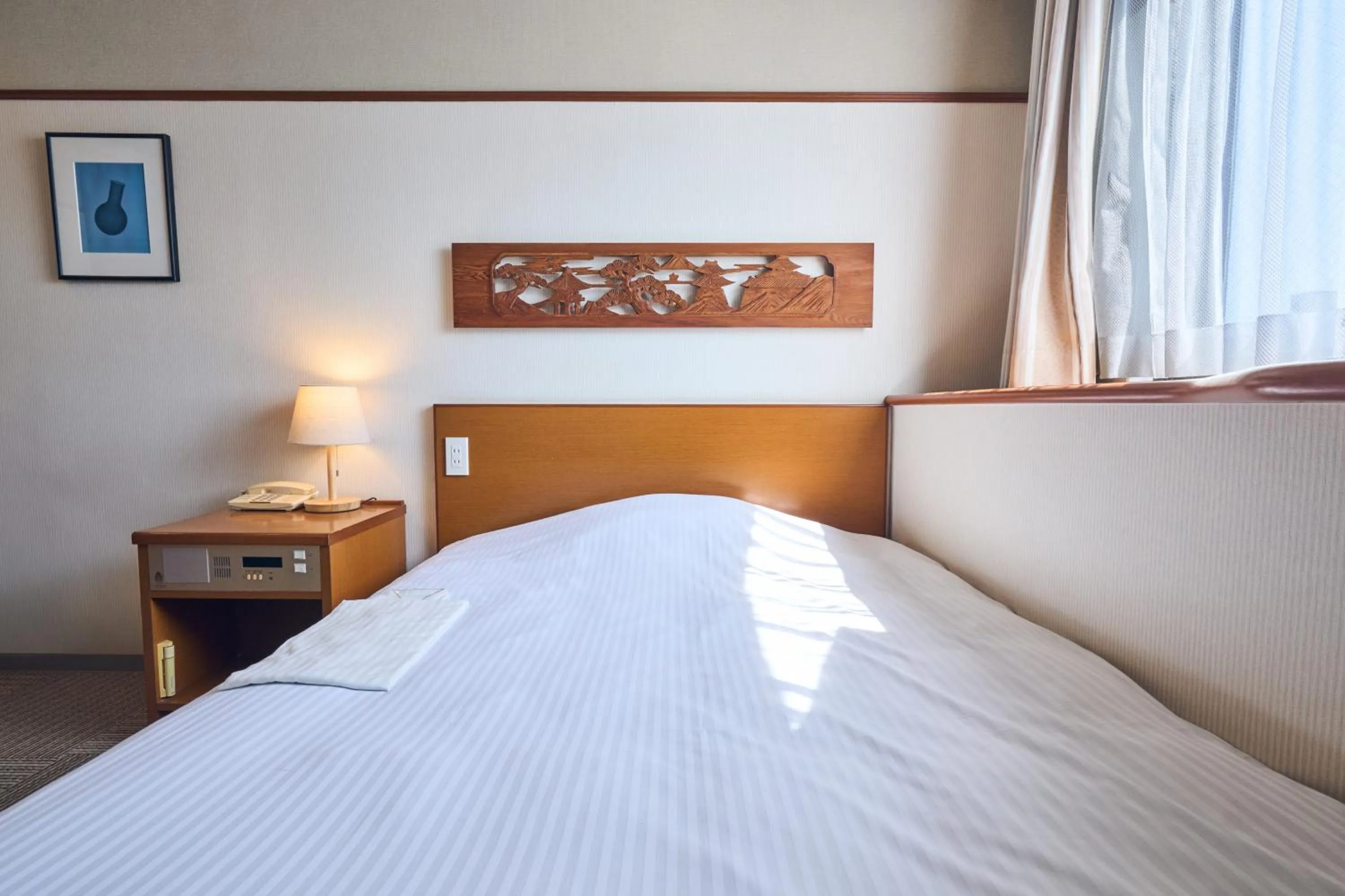 Photo of the whole room, Bed in Hotel Lexton Kagoshima