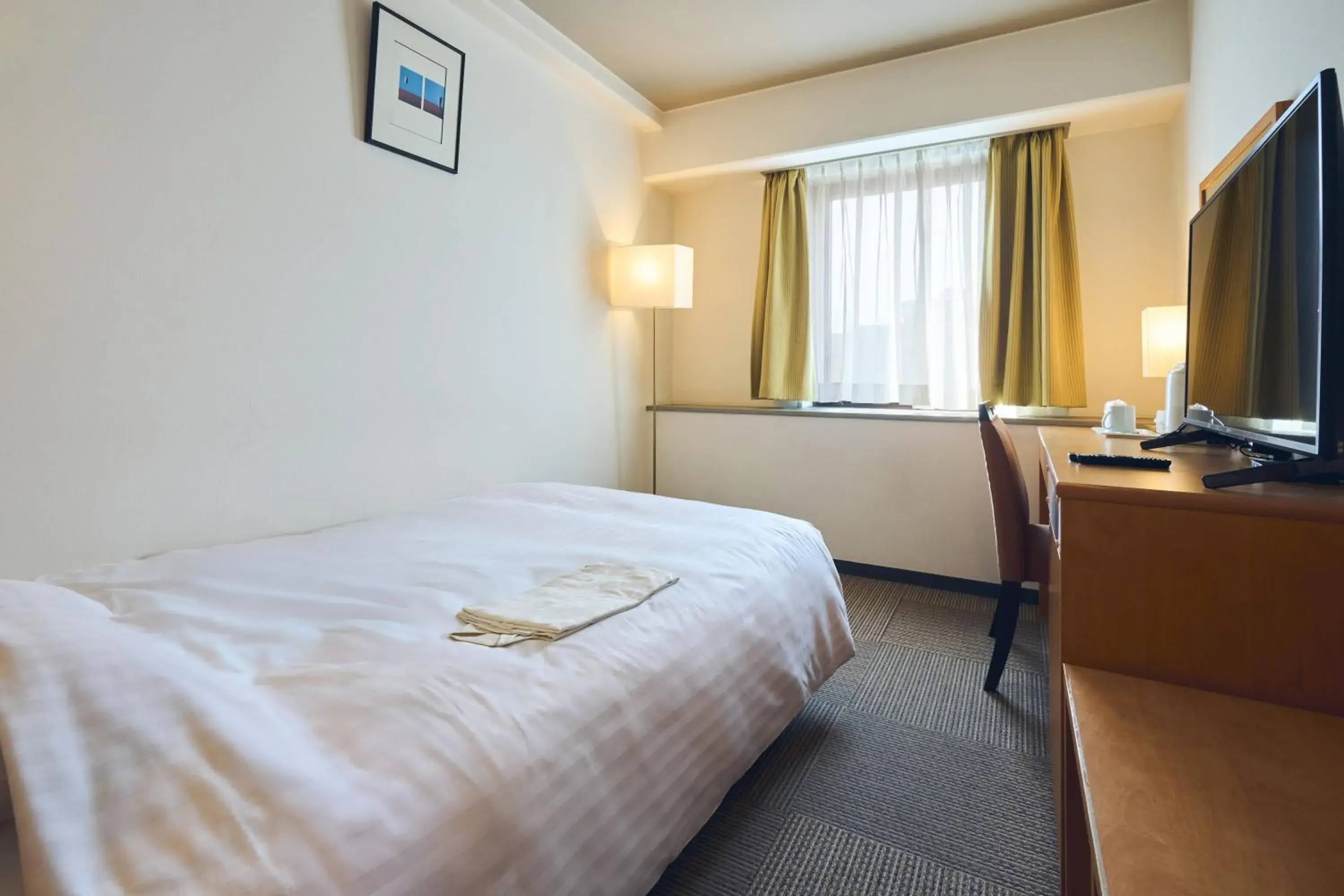 Photo of the whole room, Bed in Hotel Lexton Kagoshima Photo of the whole room, Bed in Hotel Lexton Kagoshima