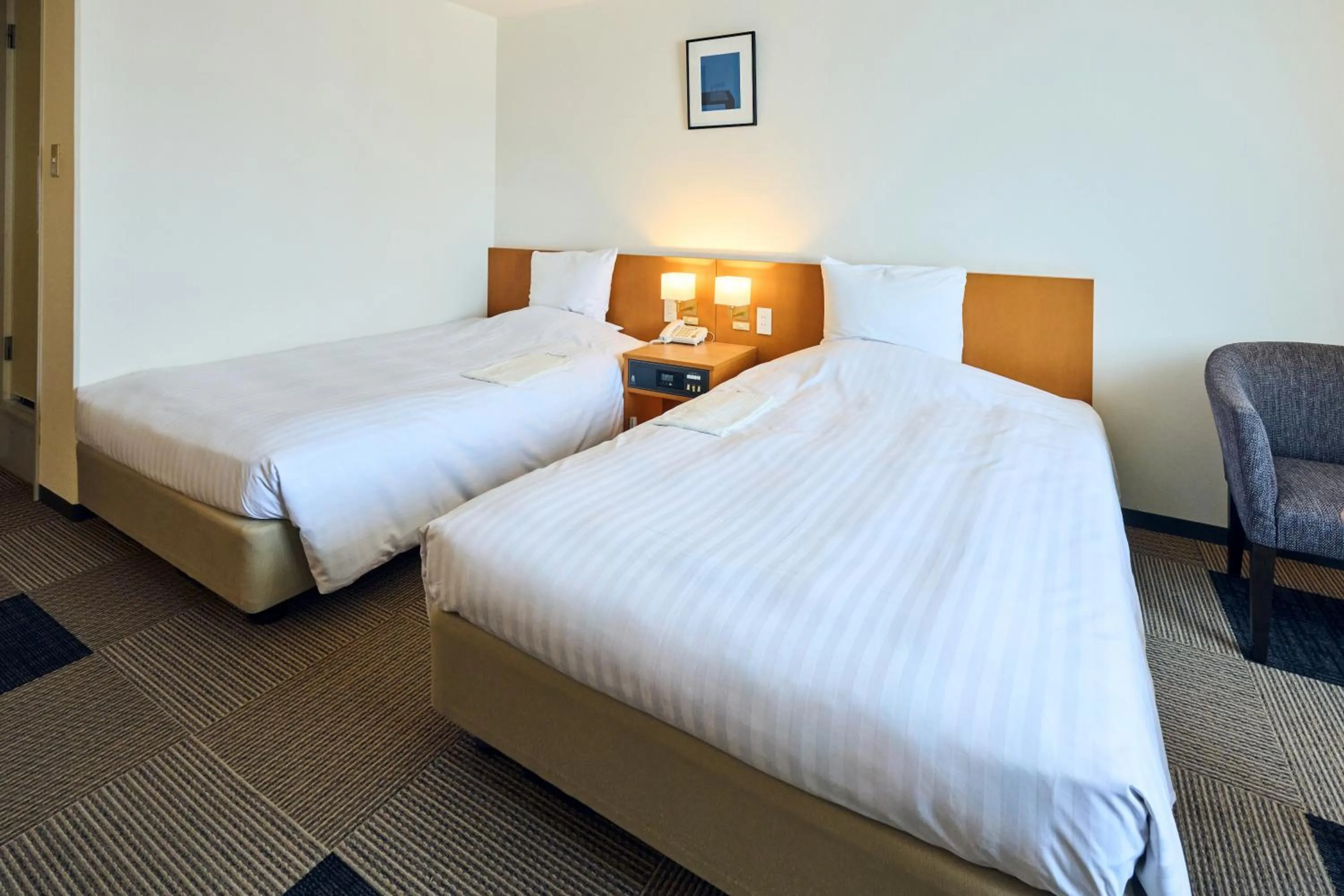 Photo of the whole room, Bed in Hotel Lexton Kagoshima