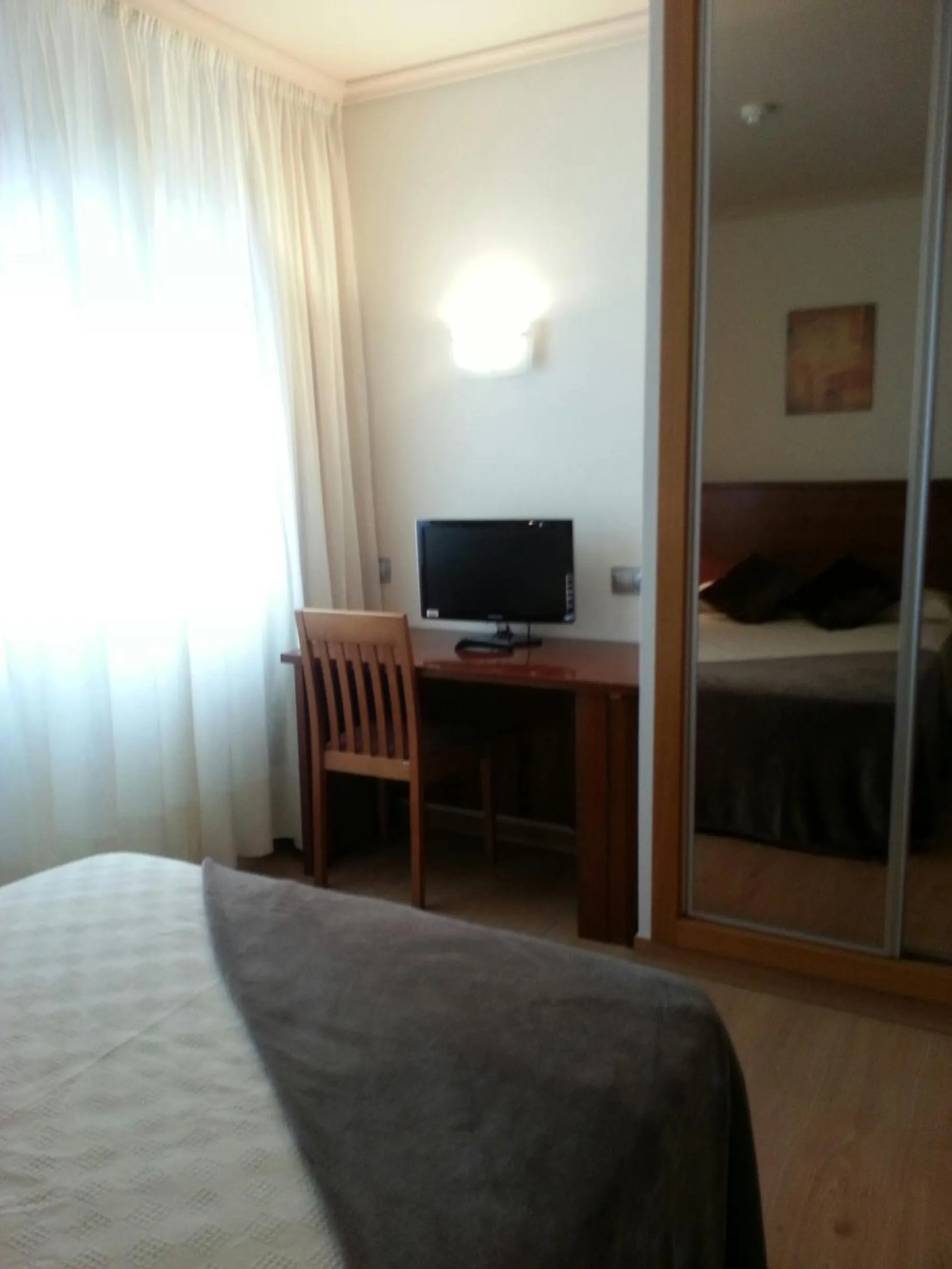 Seating area, Bed in Hotel San Cibrao