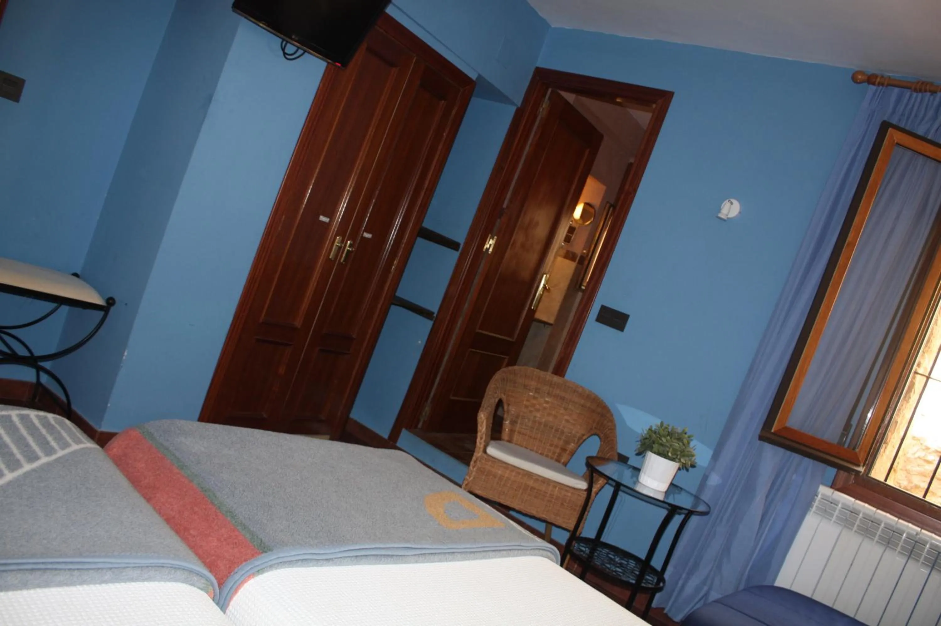 Bed in Hotel Mesón del Gallo