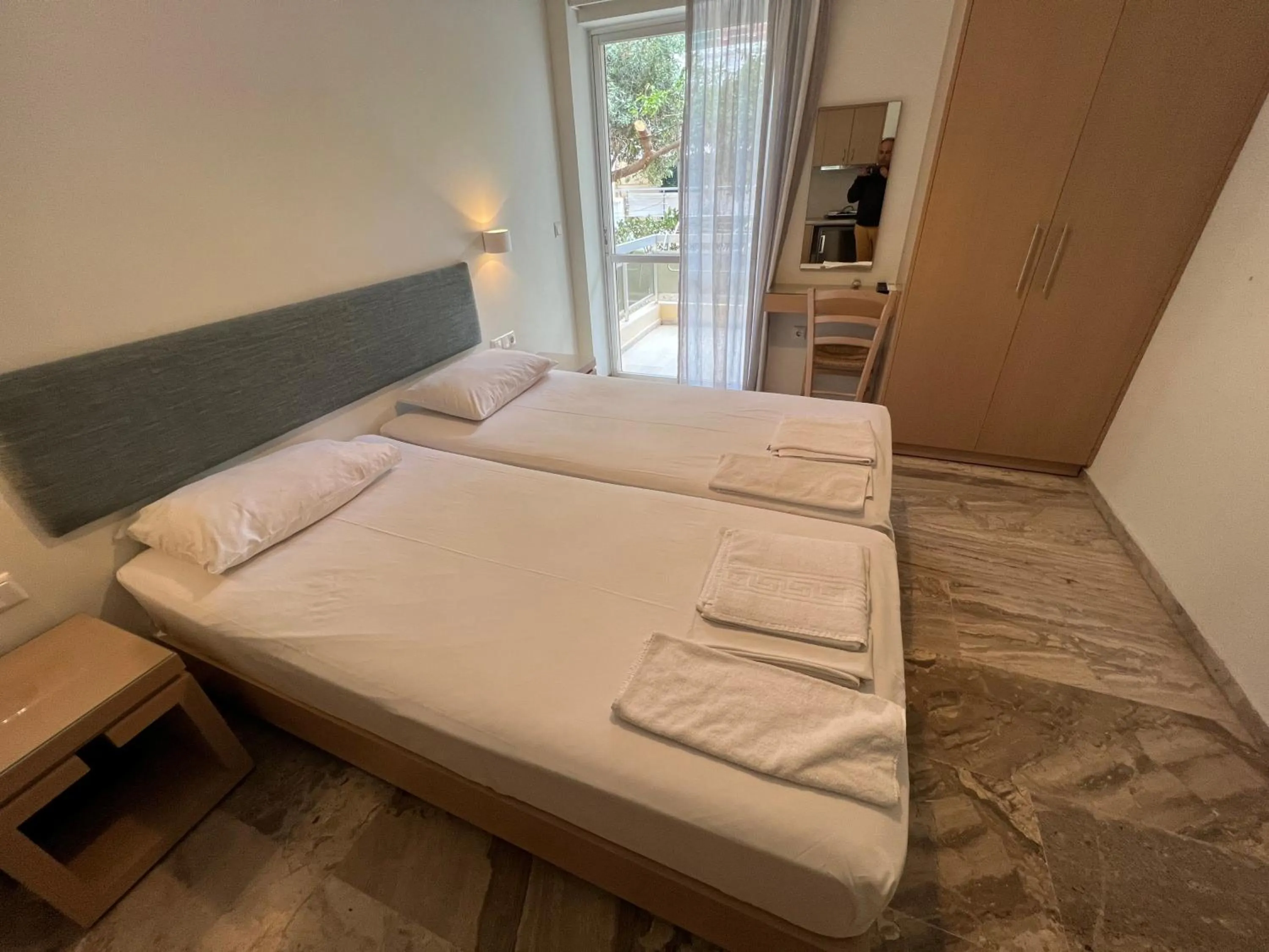 Bed in Neapolis Apartments