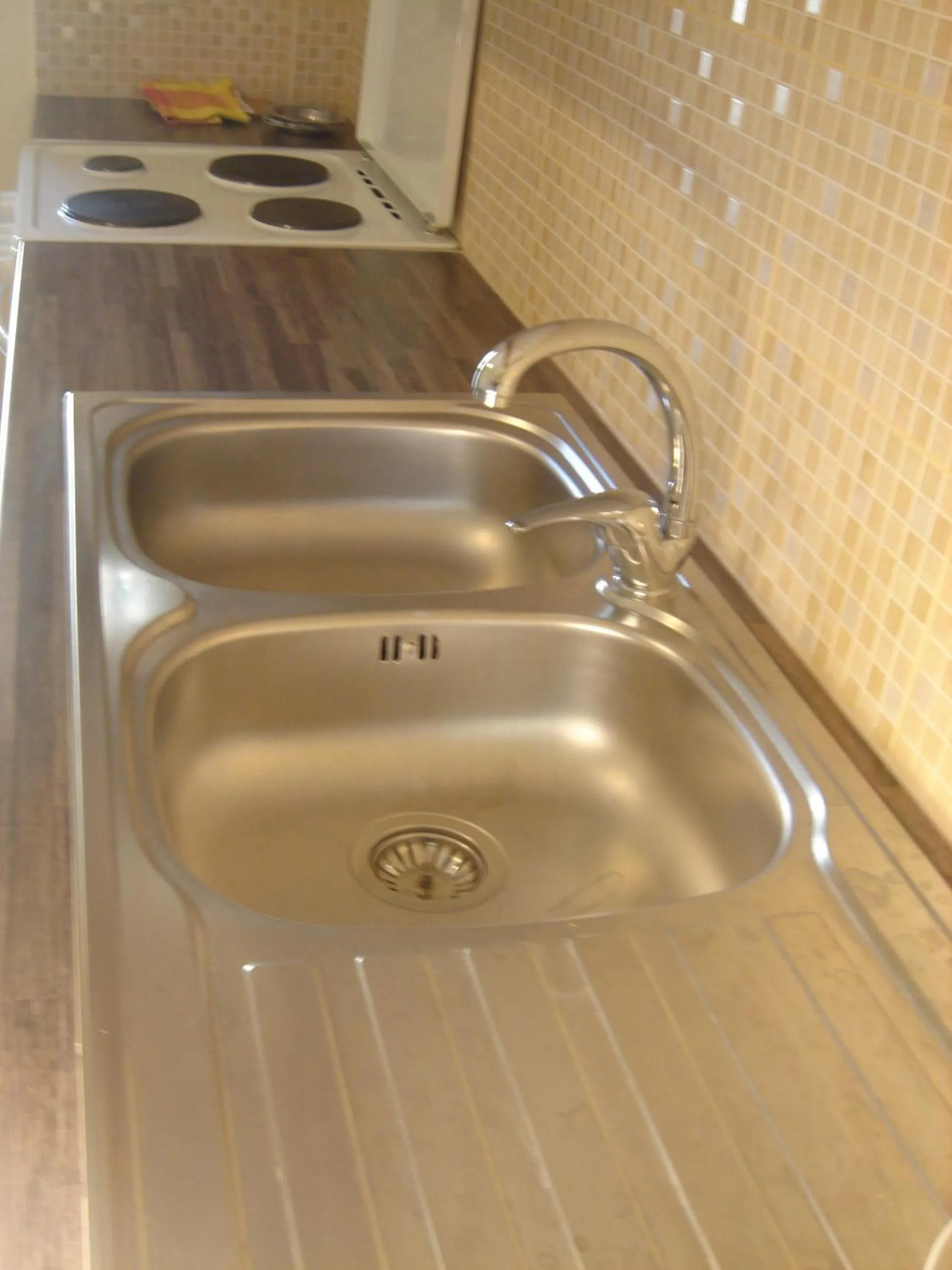 kitchen in Neapolis Apartments
