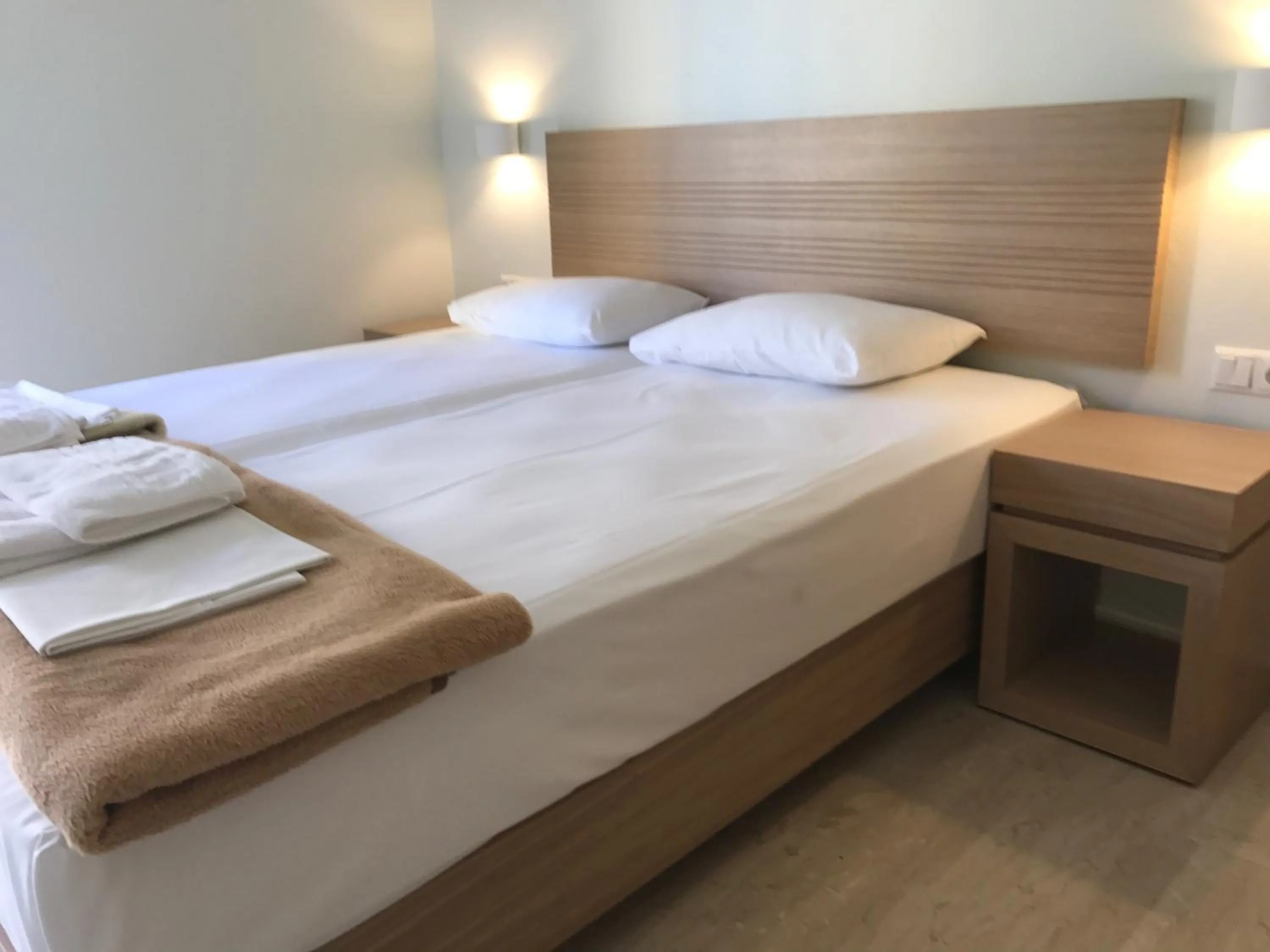 Bed in Neapolis Apartments