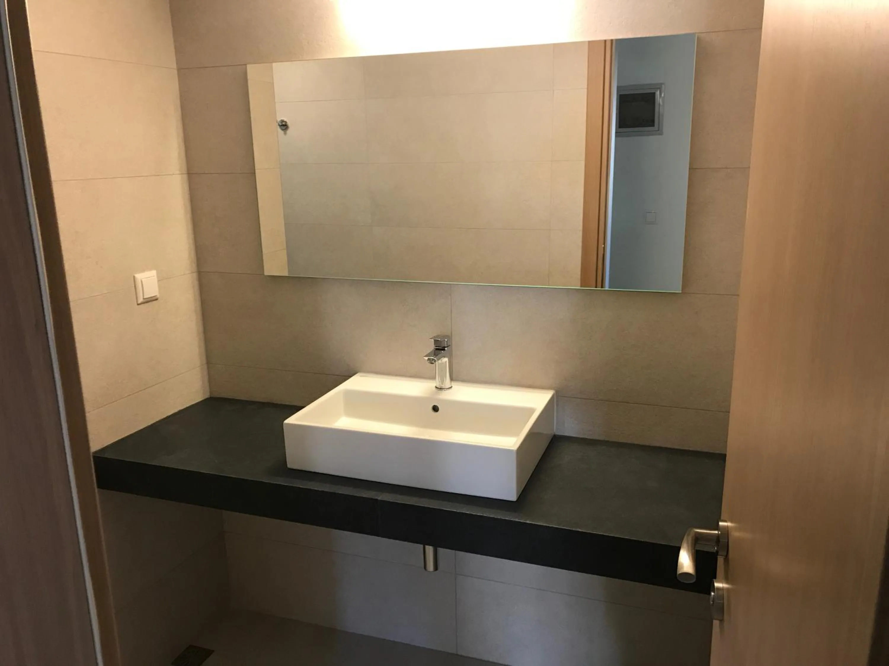 Bathroom in Neapolis Apartments