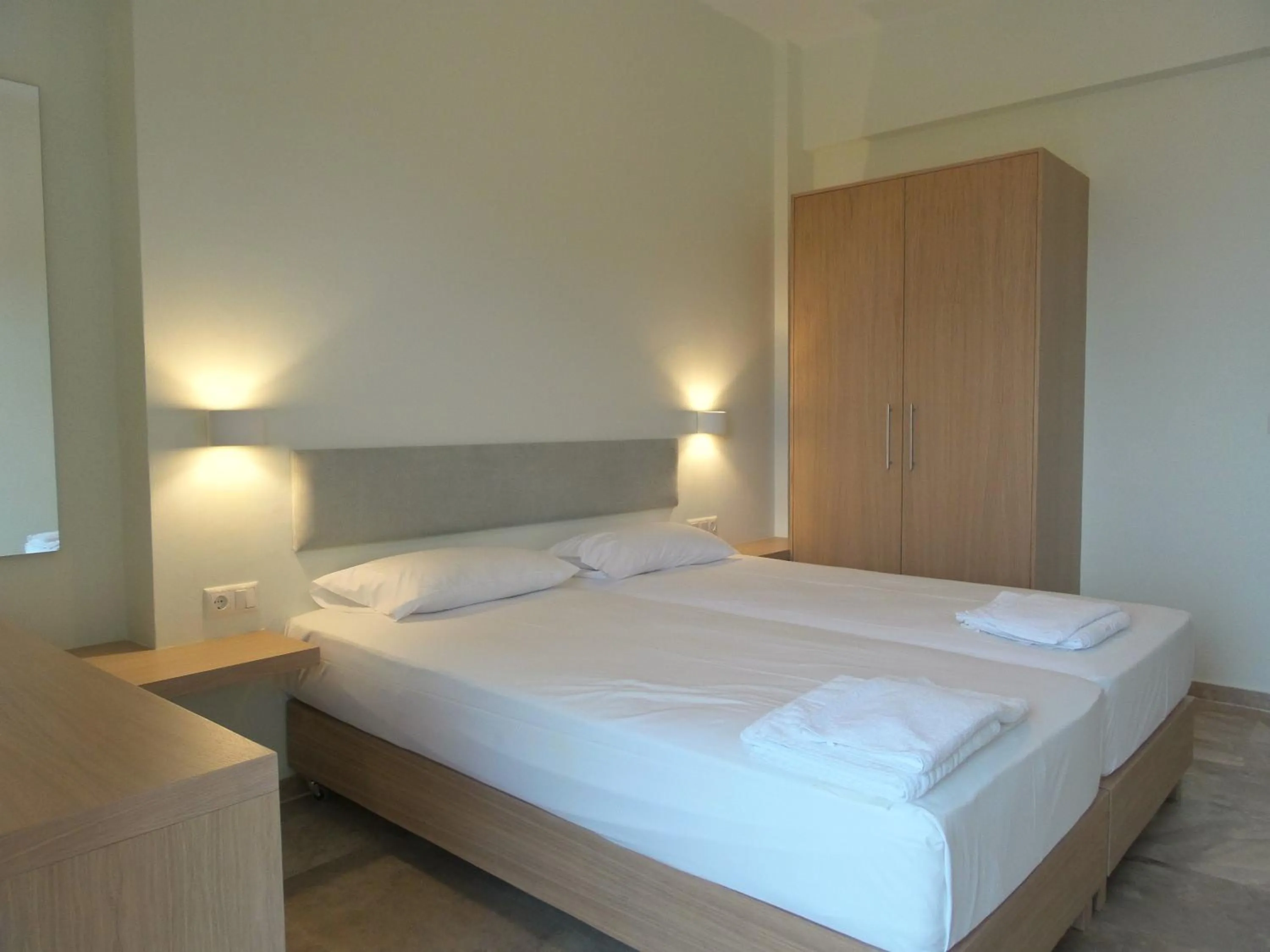 Bed in Neapolis Apartments