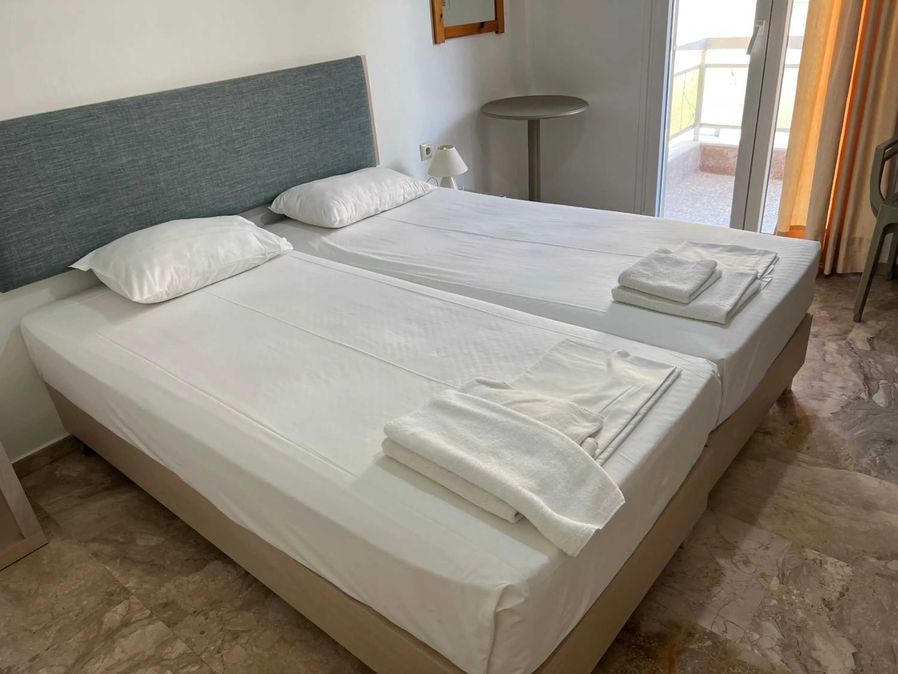 Bedroom, Bed in Neapolis Apartments