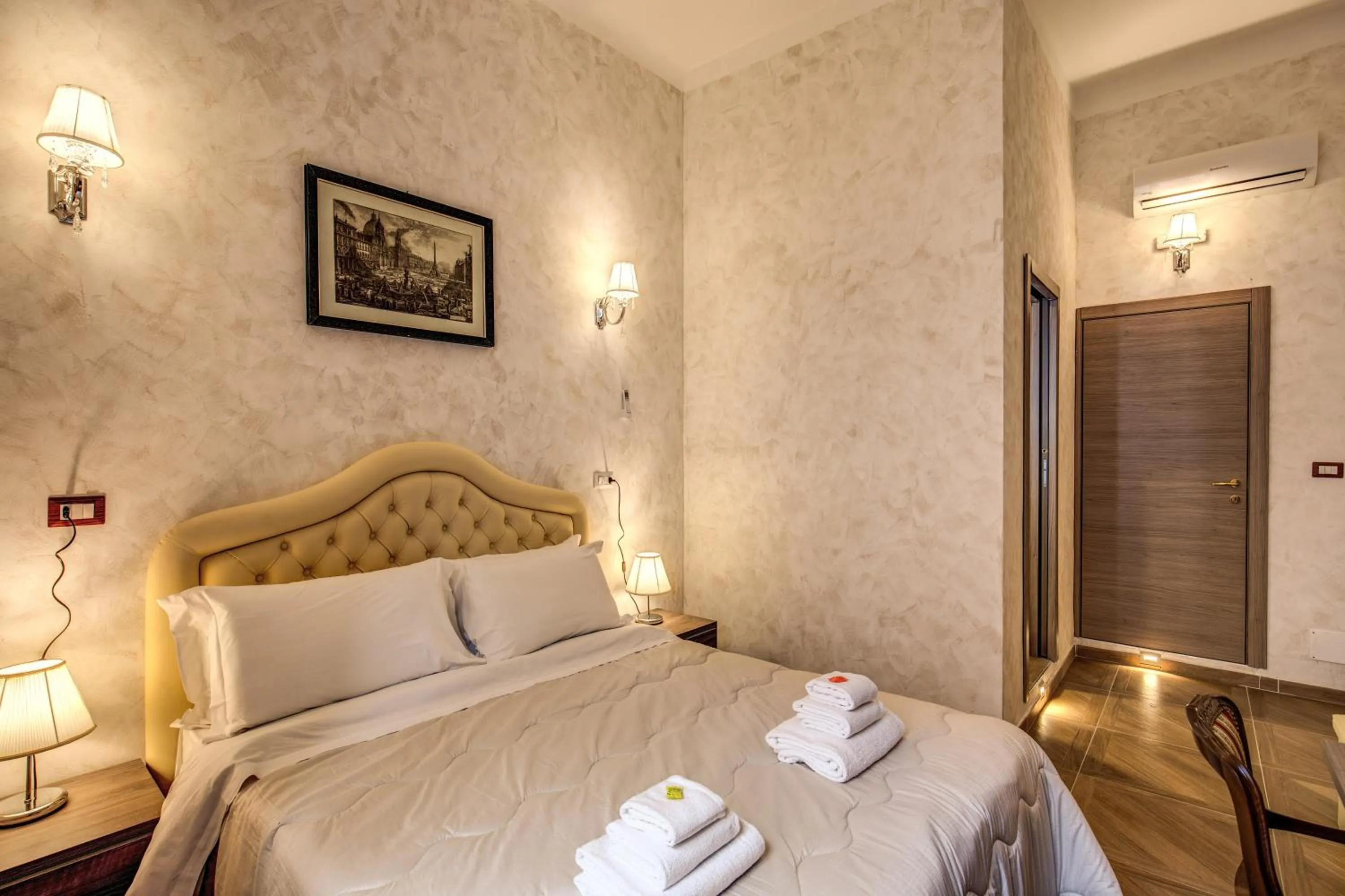 Bed in AMICI GUESTHOUSE