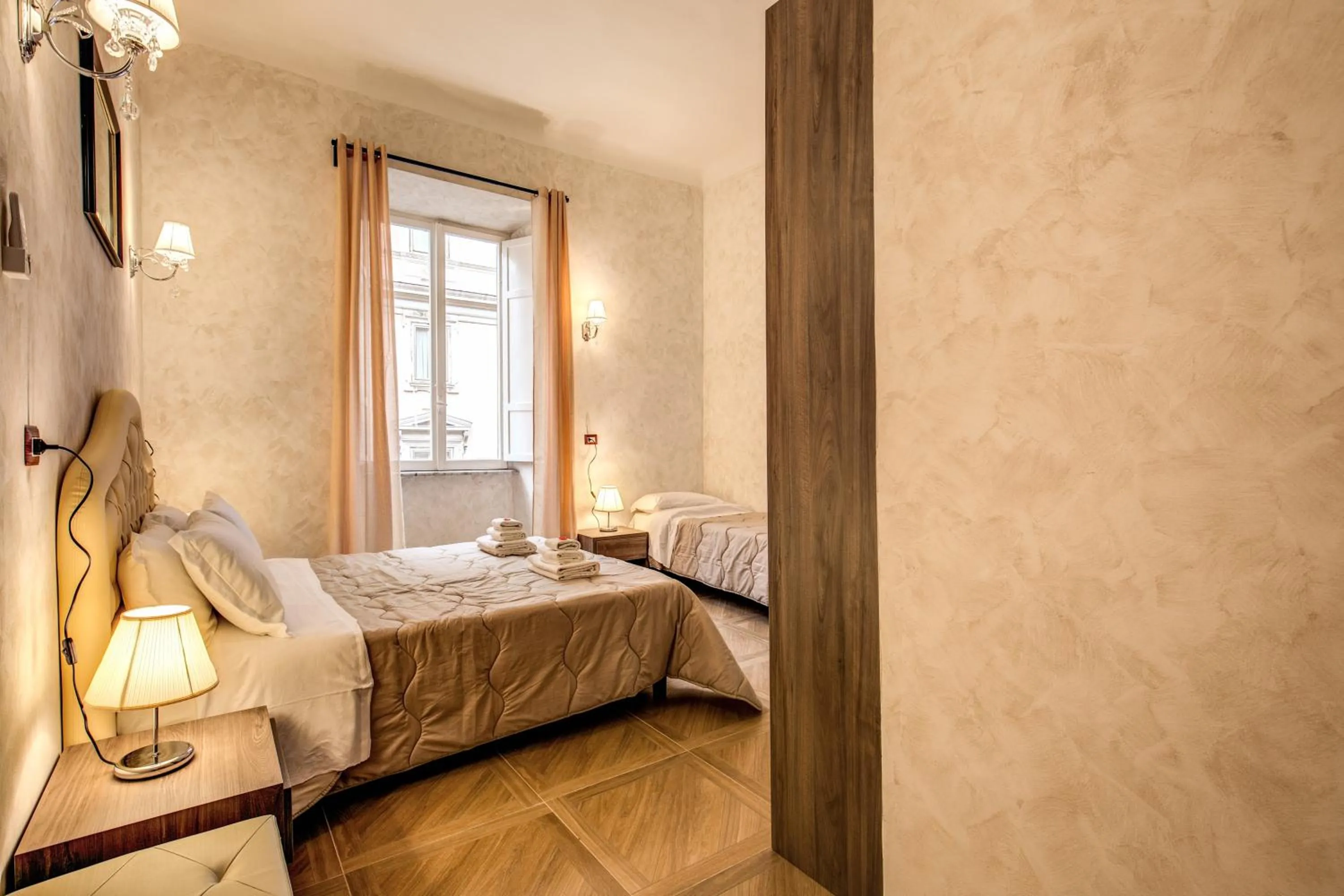 Bed in AMICI GUESTHOUSE