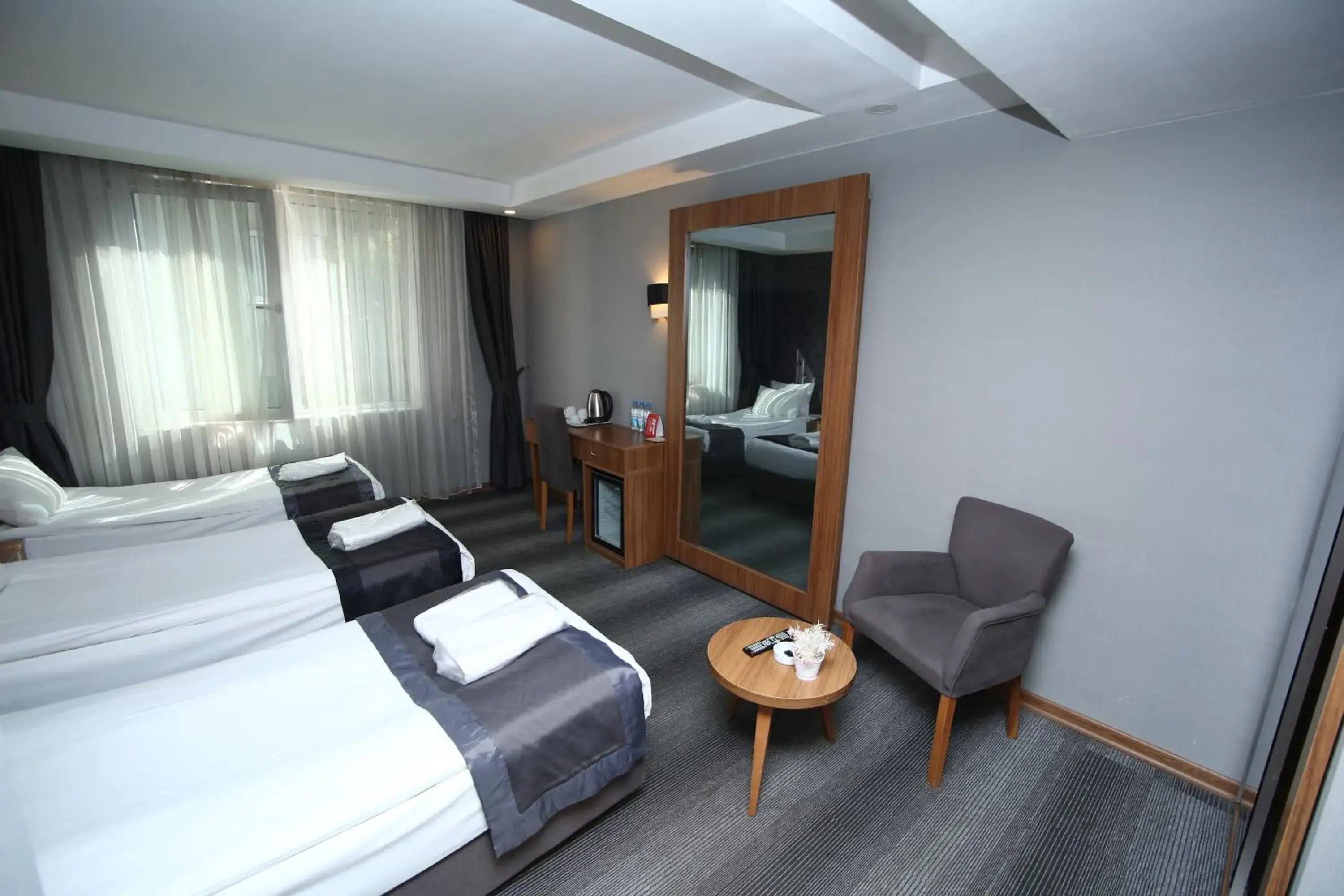 Basic Triple Room in Grand Silay Hotel Basic Triple Room in Grand Silay Hotel