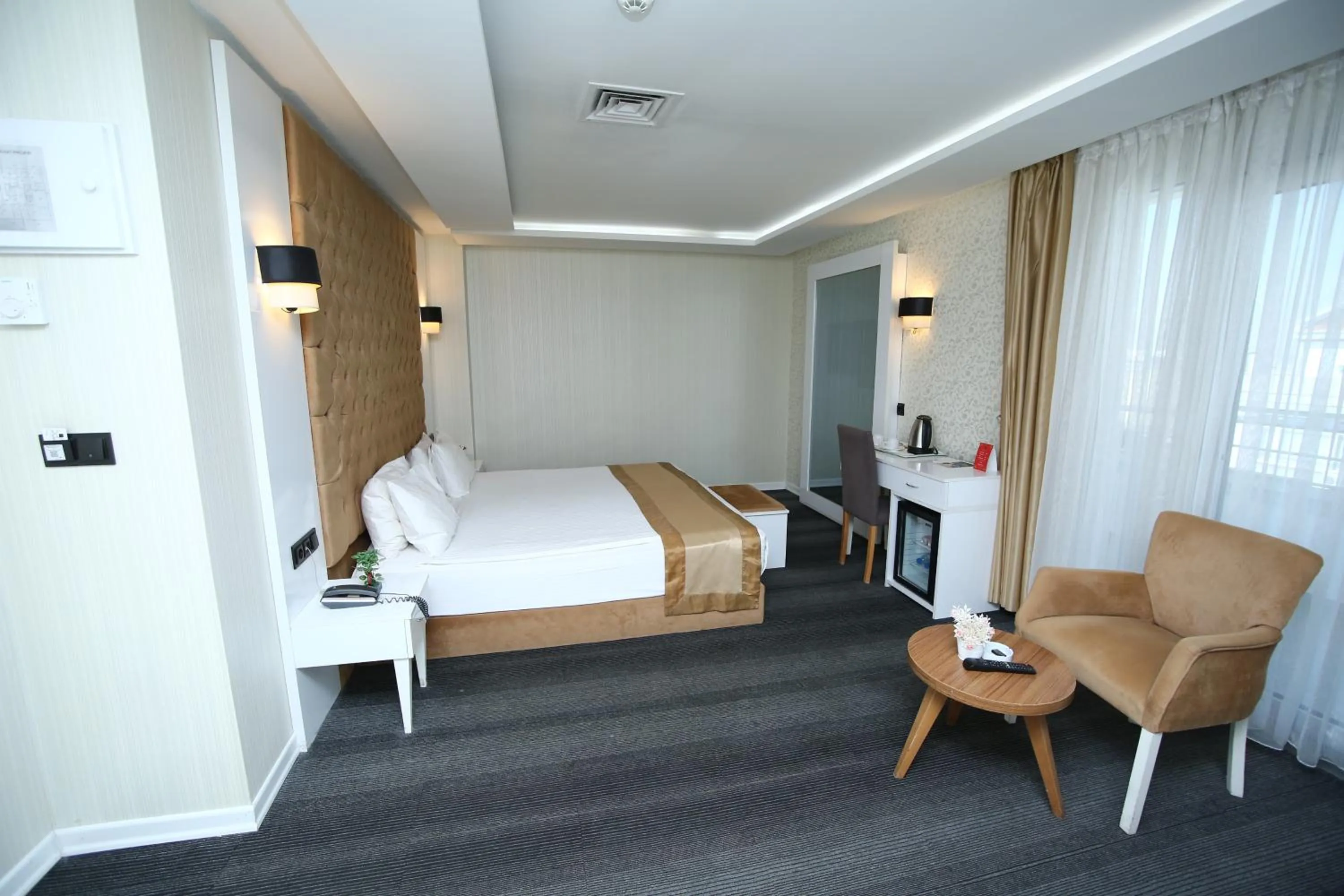 Bed in Grand Silay Hotel