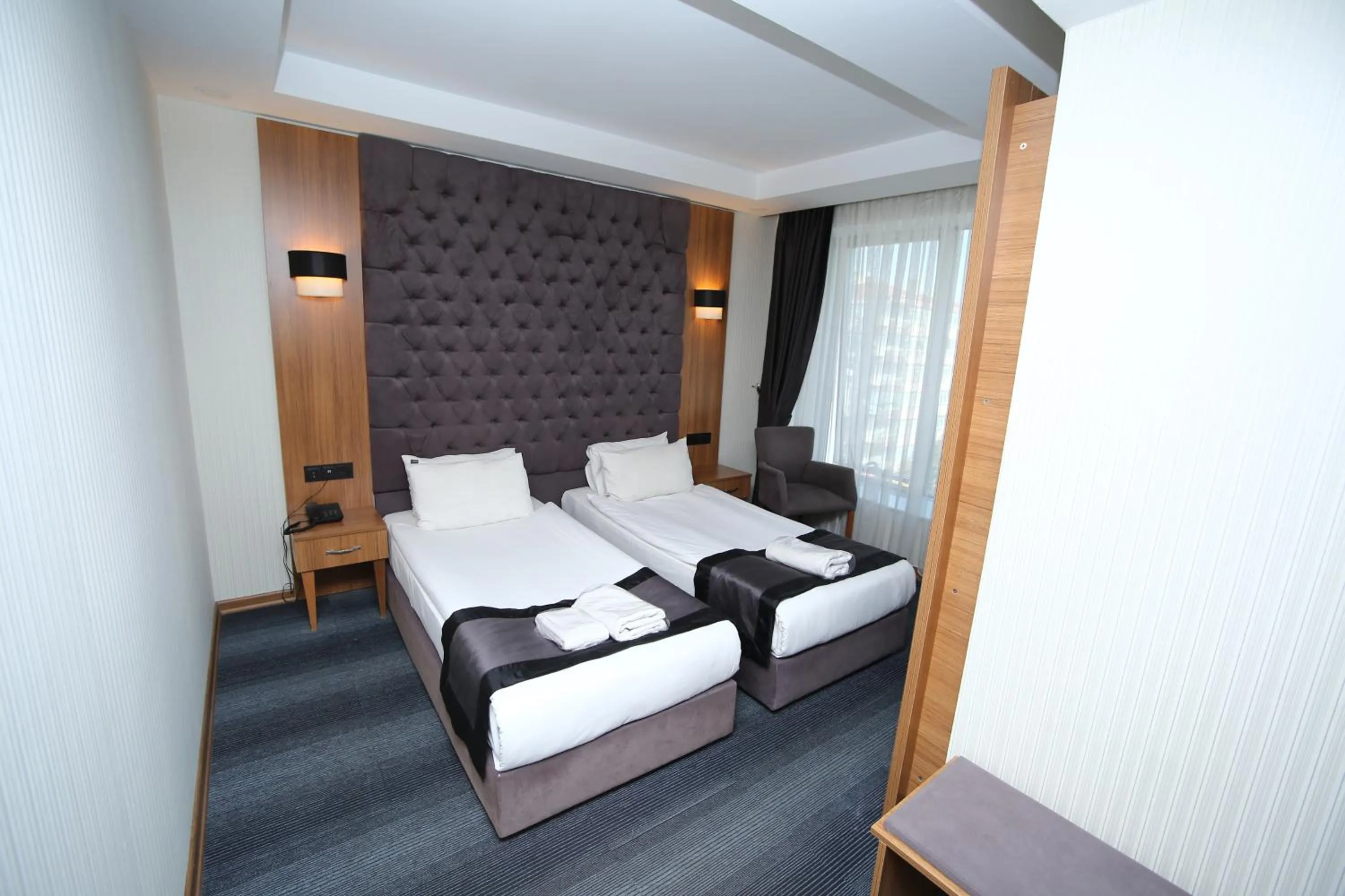 Bed in Grand Silay Hotel