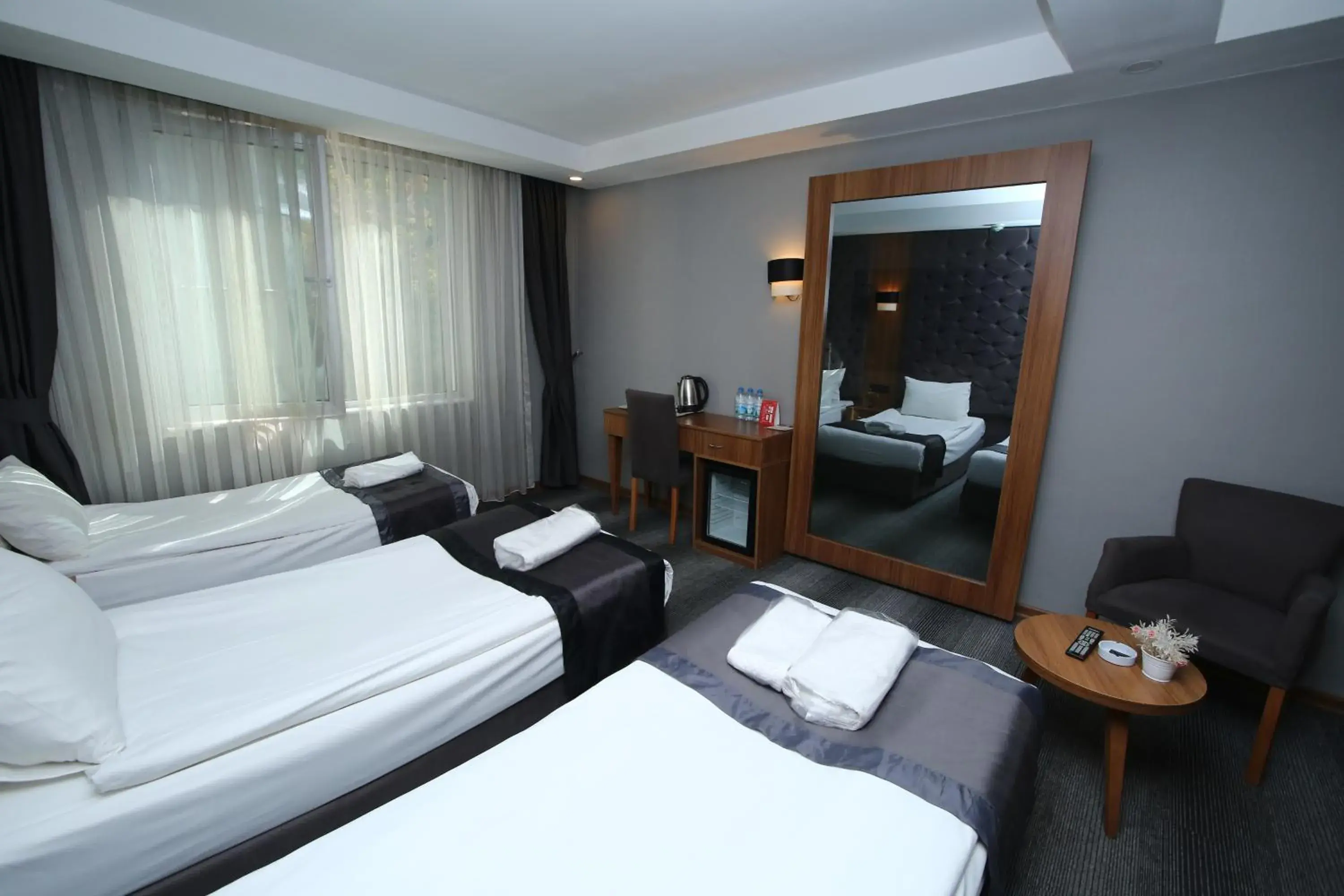 Basic Triple Room in Grand Silay Hotel Basic Triple Room in Grand Silay Hotel